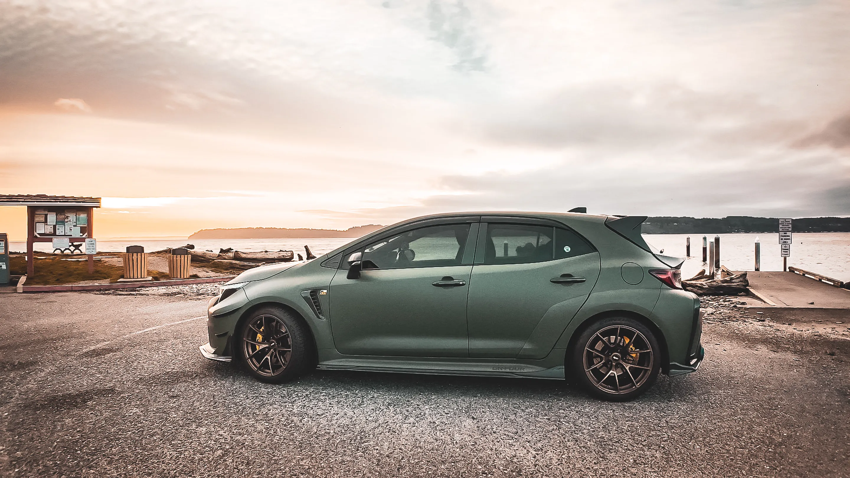 Green Toyota GR Corolla with 18" VS-5RS Apex wheels in Satin Bronze