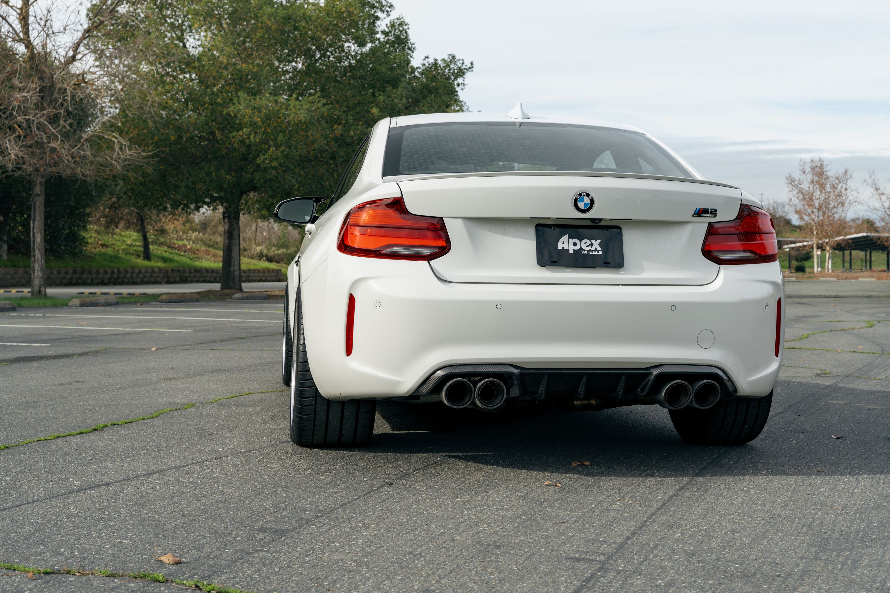 White BMW F87 M2 with 19" ML-10RT Apex wheels in Machined Lip Race Silver