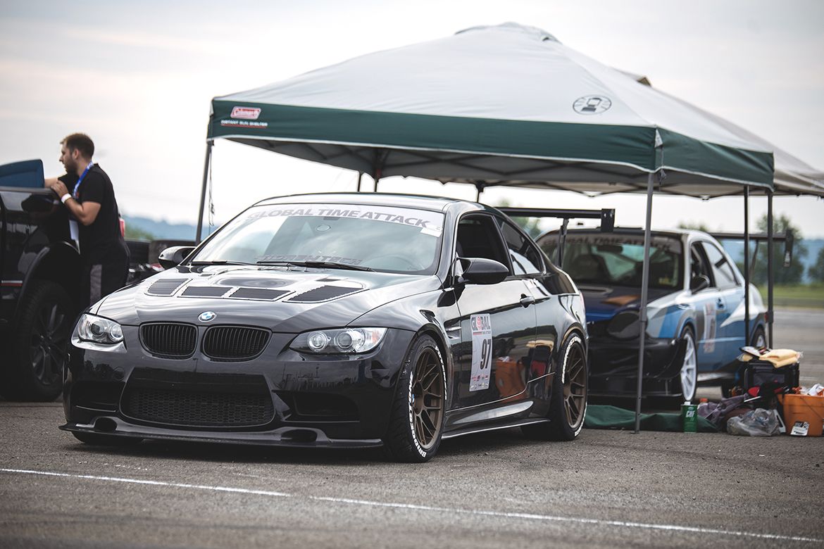 Black BMW E92 Coupe M3 with 18" ARC-8 Apex wheels in Satin Bronze