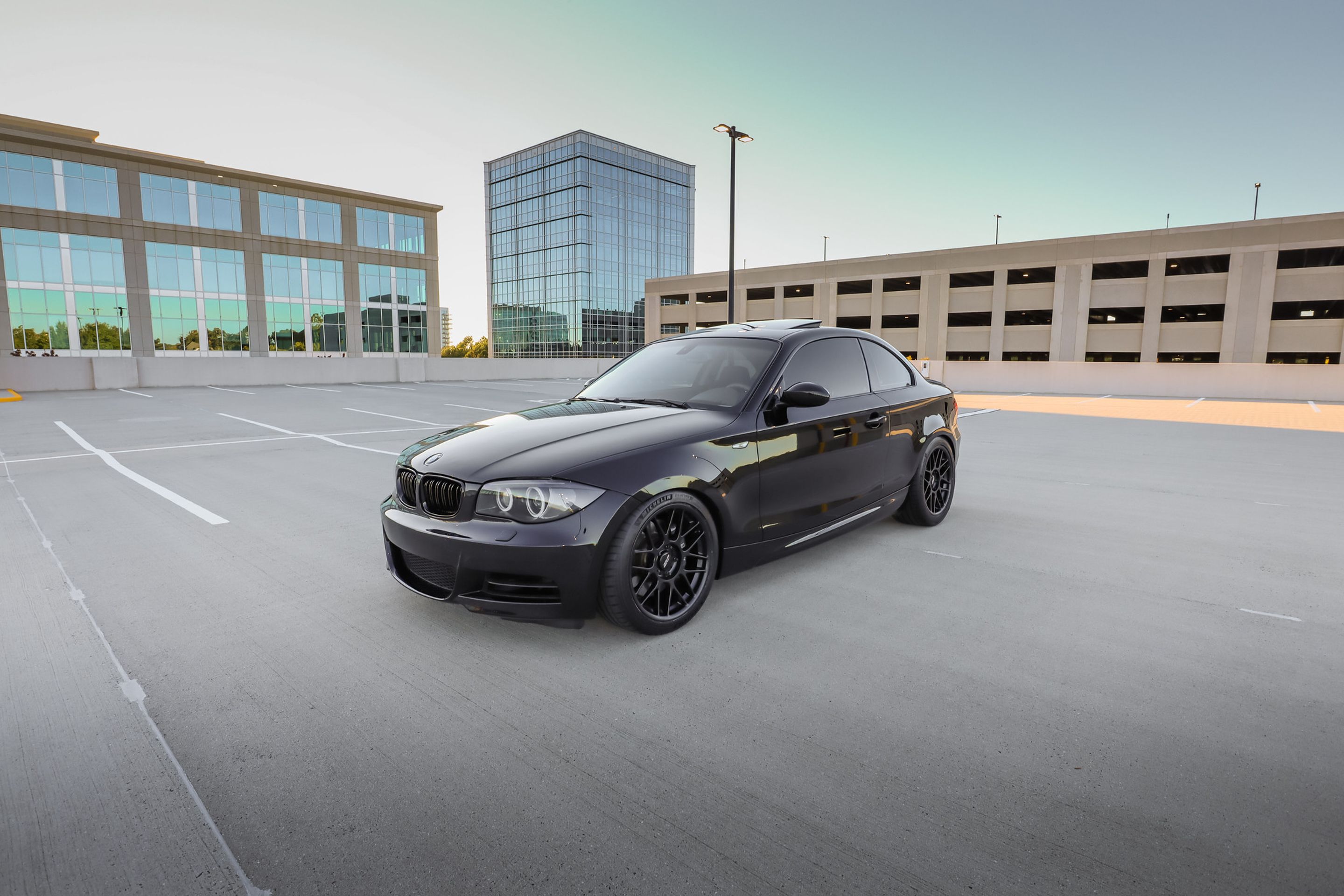 Black BMW E82 Coupe 1 Series with 18" ARC-8 Apex wheels in Satin Black