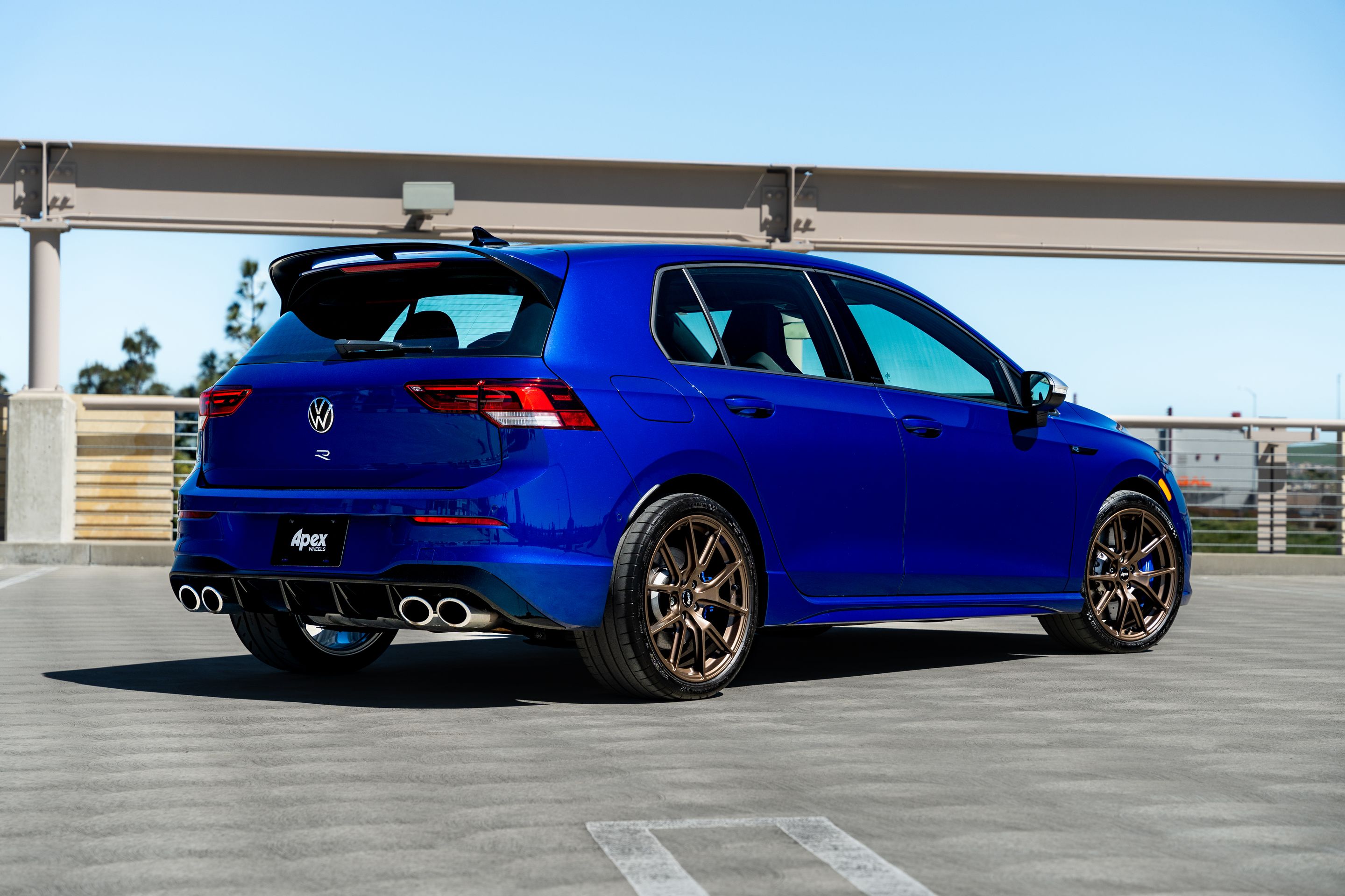 Blue VW MK8 Golf R with 18" VS-5 Apex wheels in Satin Bronze