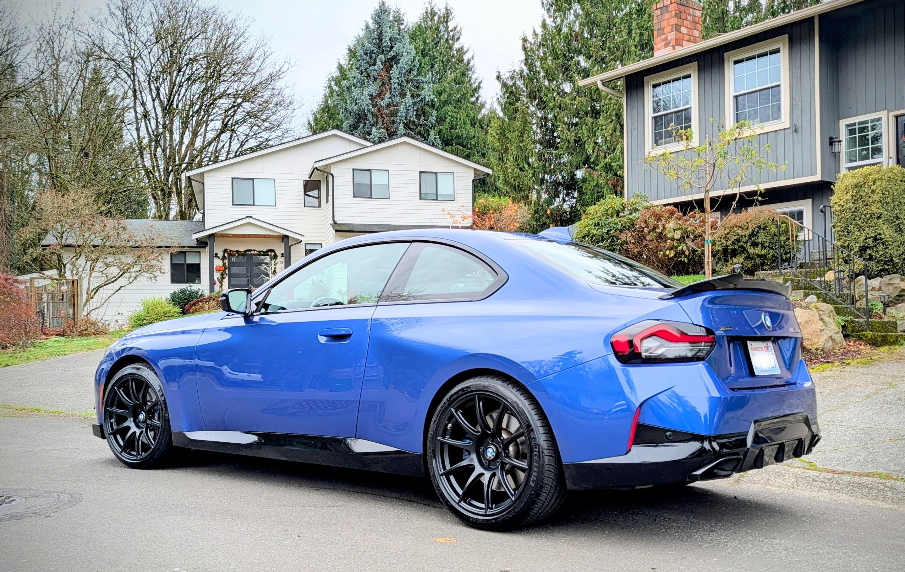 Blue BMW G42 2 Series with 19" SM-10 Apex wheels in Satin Black