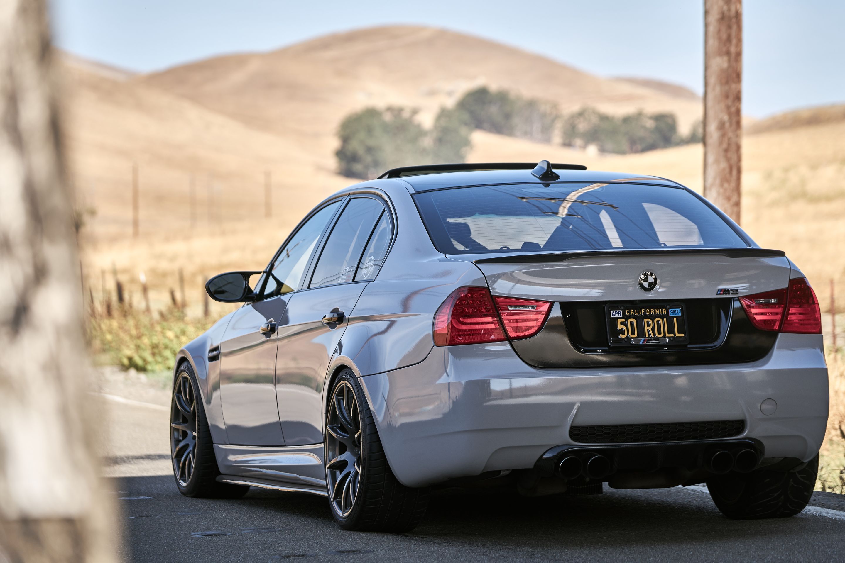 Grey BMW E90 Sedan M3 with 19" SM-10 Apex wheels in Satin Black