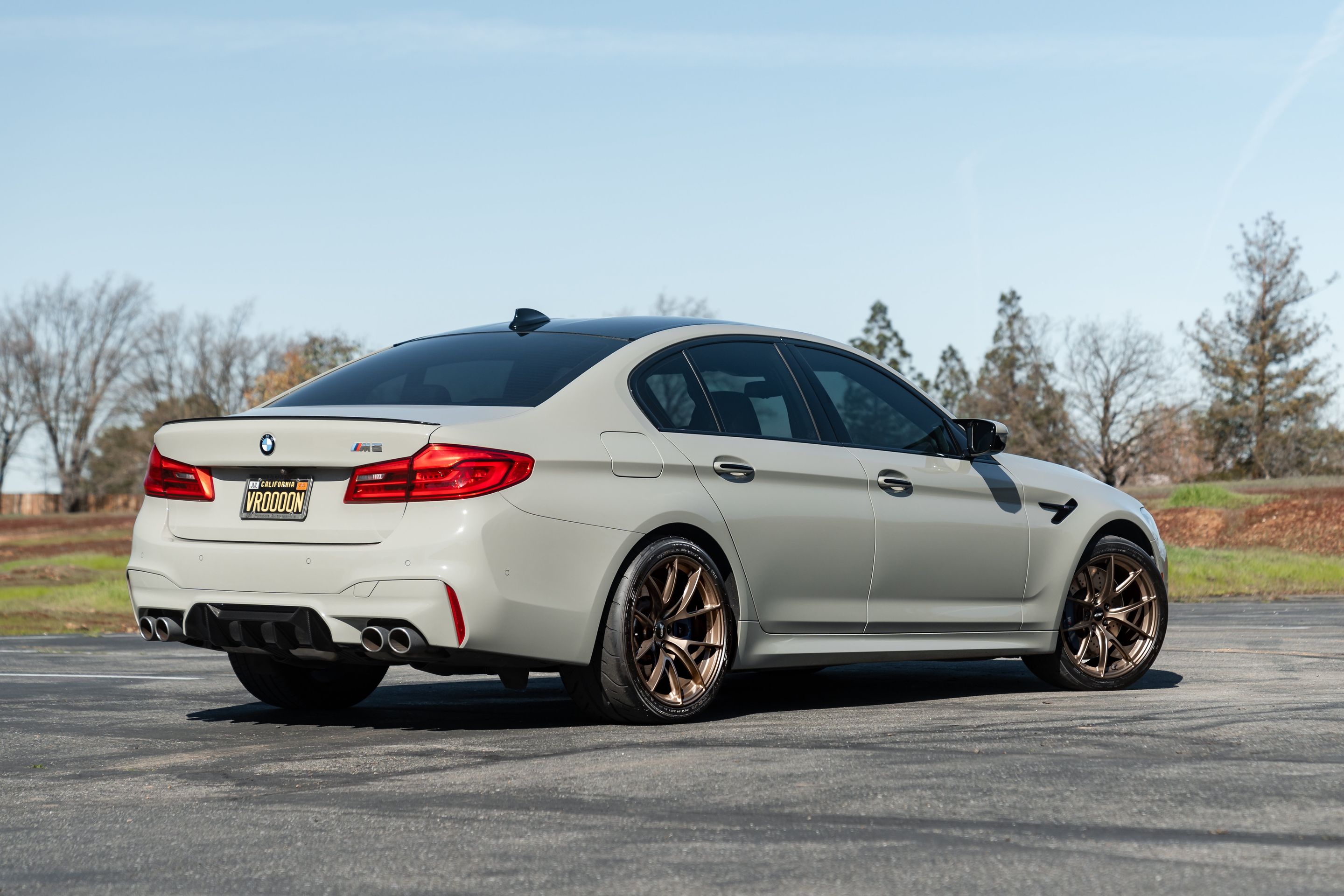 Grey BMW F90 M5 with 19" VS-5RS Apex wheels in Satin Bronze