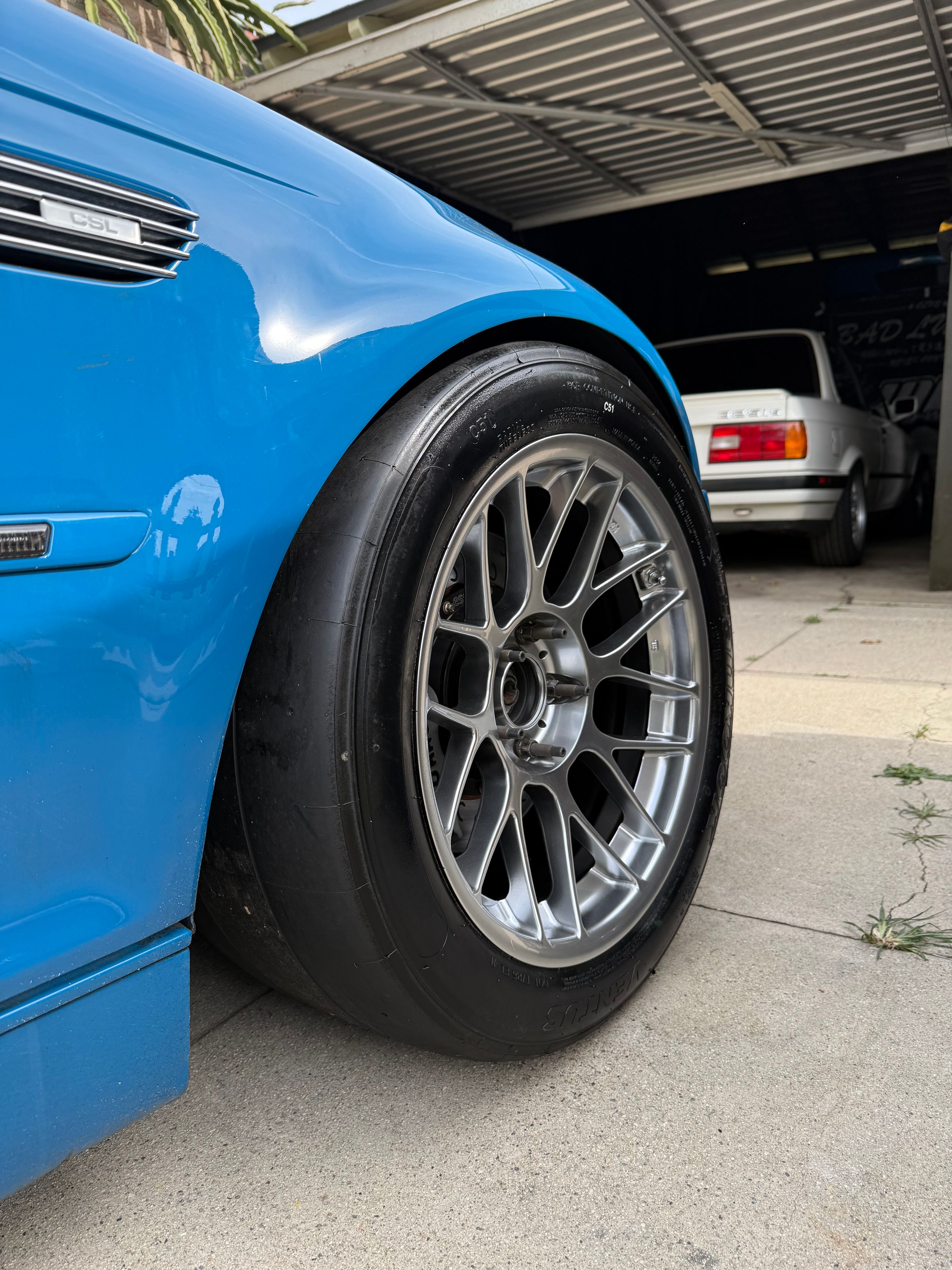 Blue BMW E46 M3 with 17" ARC-8 Apex wheels in Hyper Black