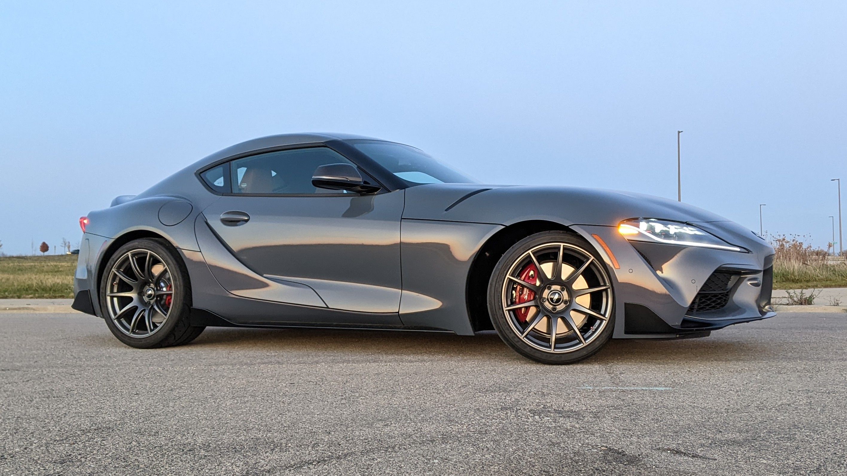 Grey Toyota GR Supra with 19" SM-10 Apex wheels in Anthracite