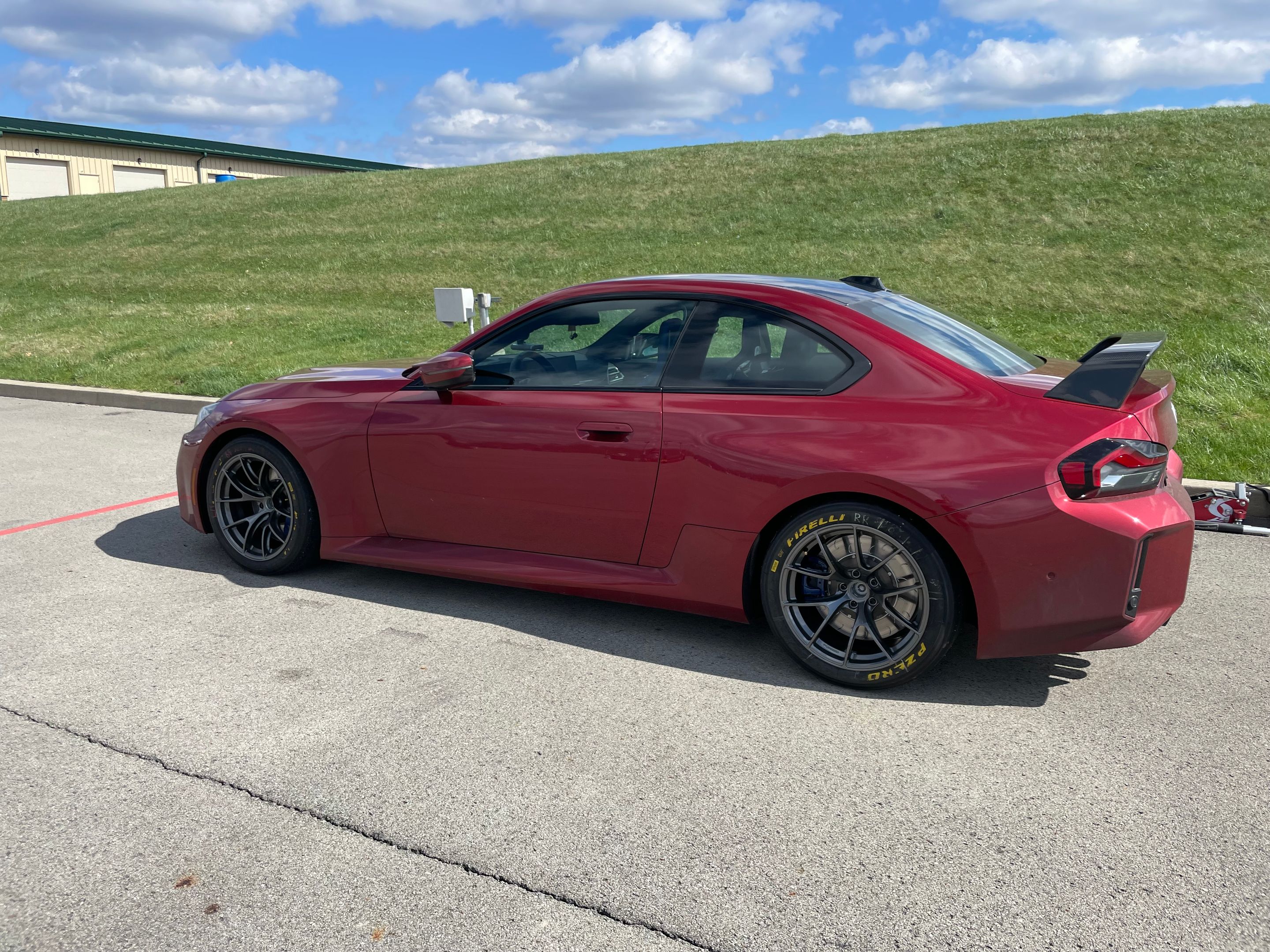 Red BMW G87 M2 with 18" VS-5RS Apex wheels in Anthracite