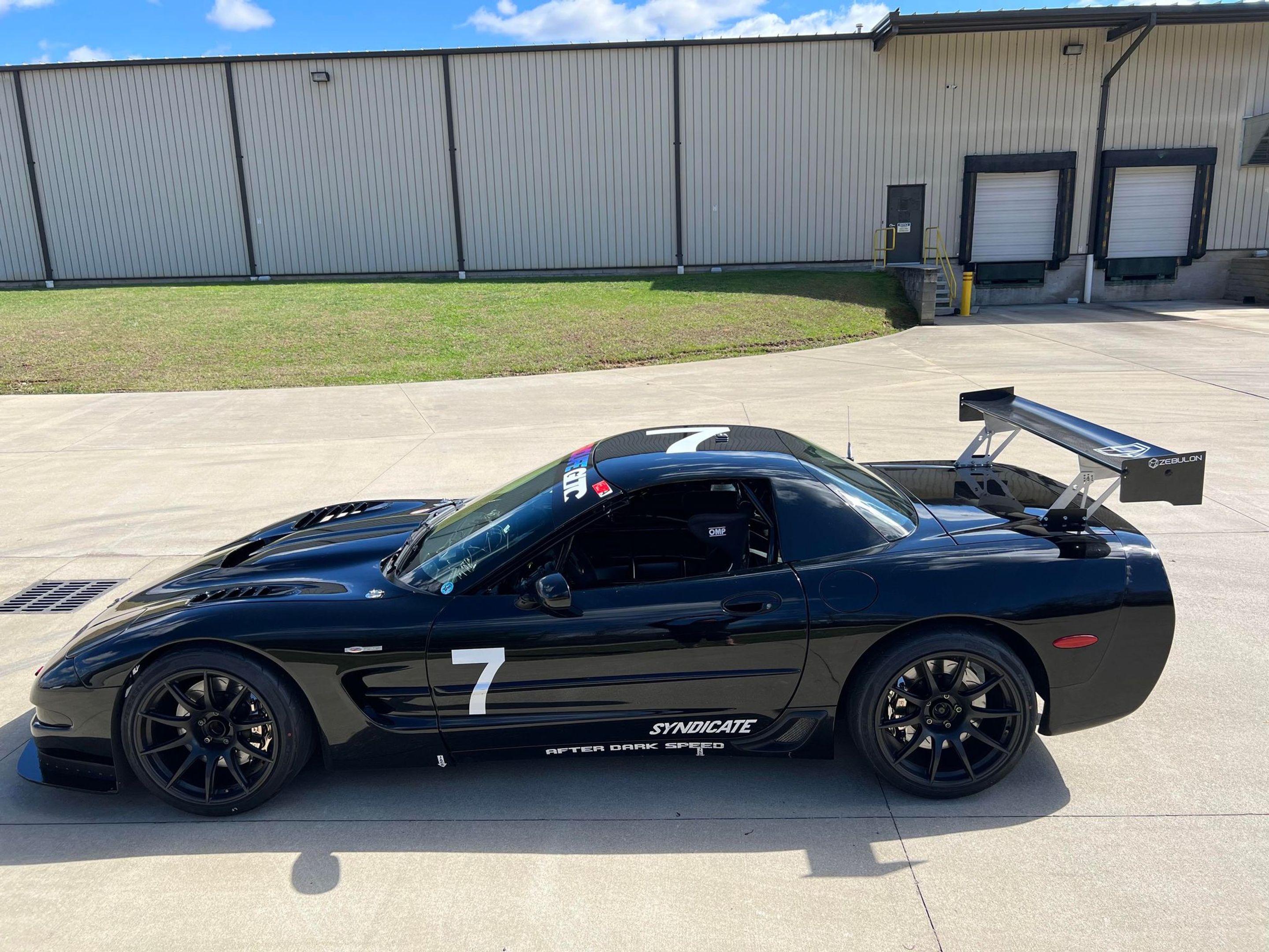 Black Chevrolet C5 Corvette Z06 with 19" SM-10 Apex wheels in Satin Black