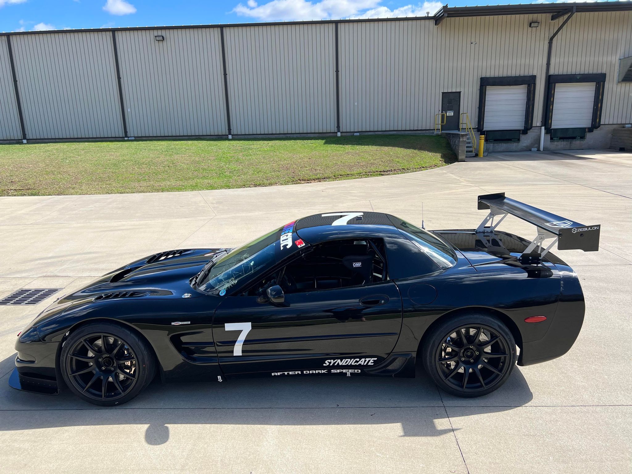 Black Chevrolet C5 Corvette Z06 with 19" SM-10 Apex wheels in Satin Black