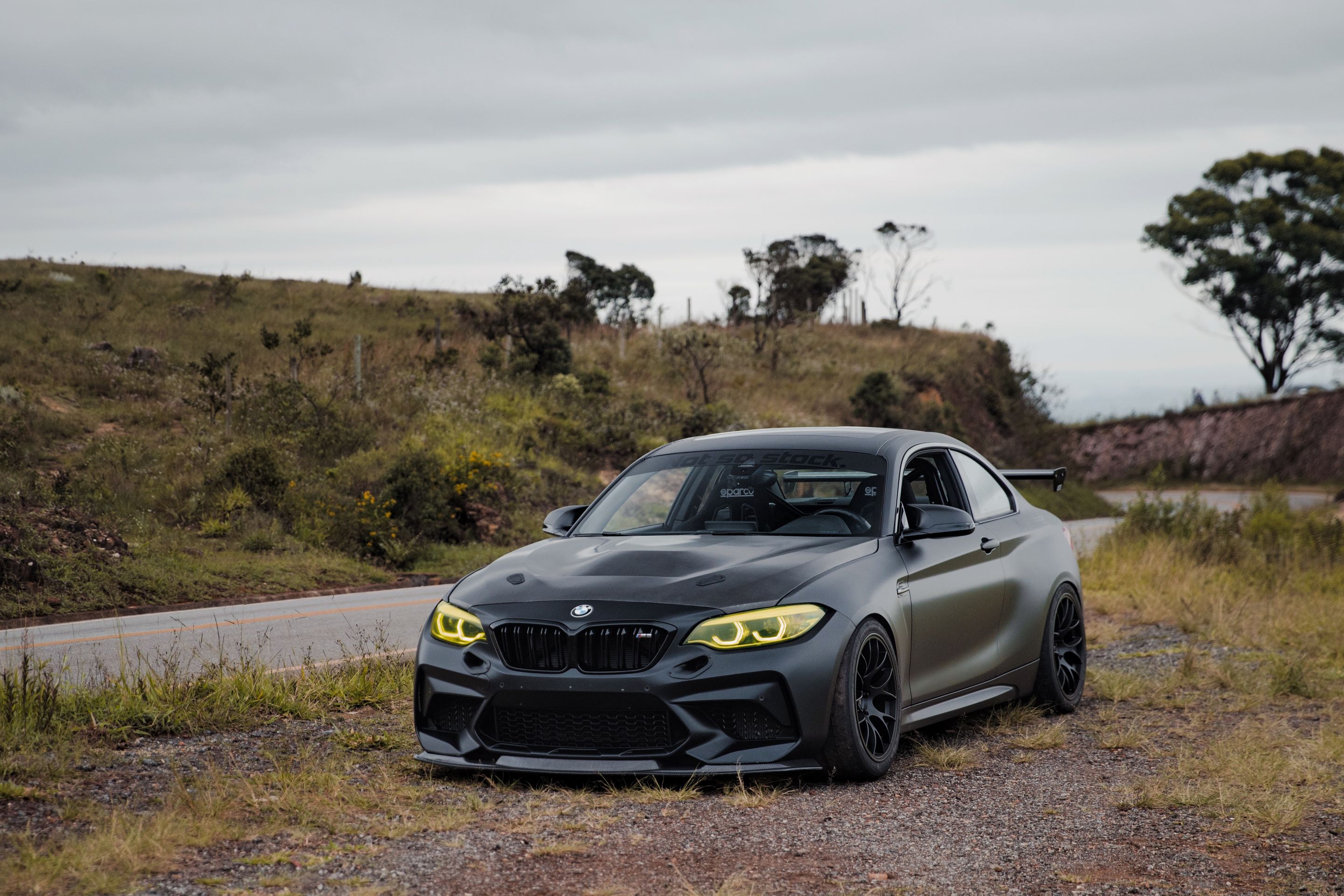 Black BMW F87 M2 with 18" EC-7 Apex wheels in Satin Black