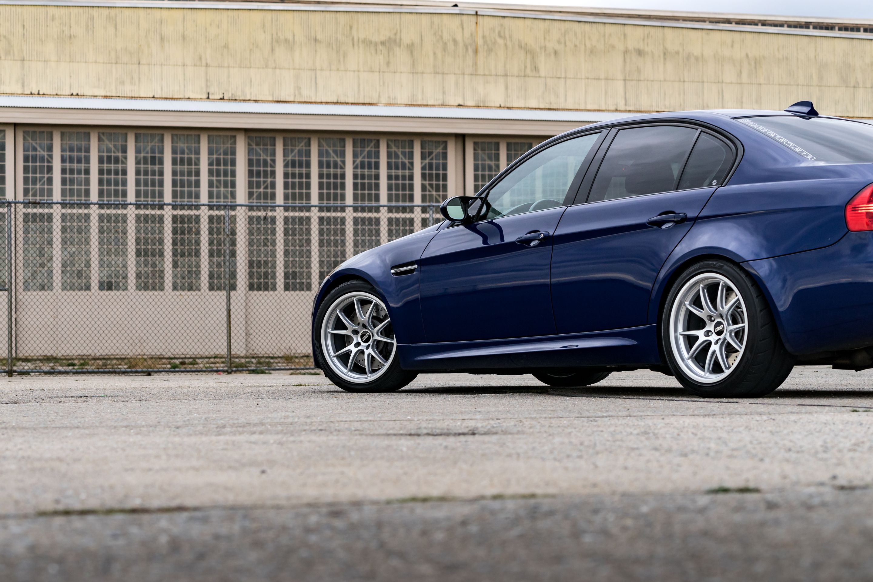 Blue BMW E90 Sedan M3 with 18" FL-5 Apex wheels in Race Silver