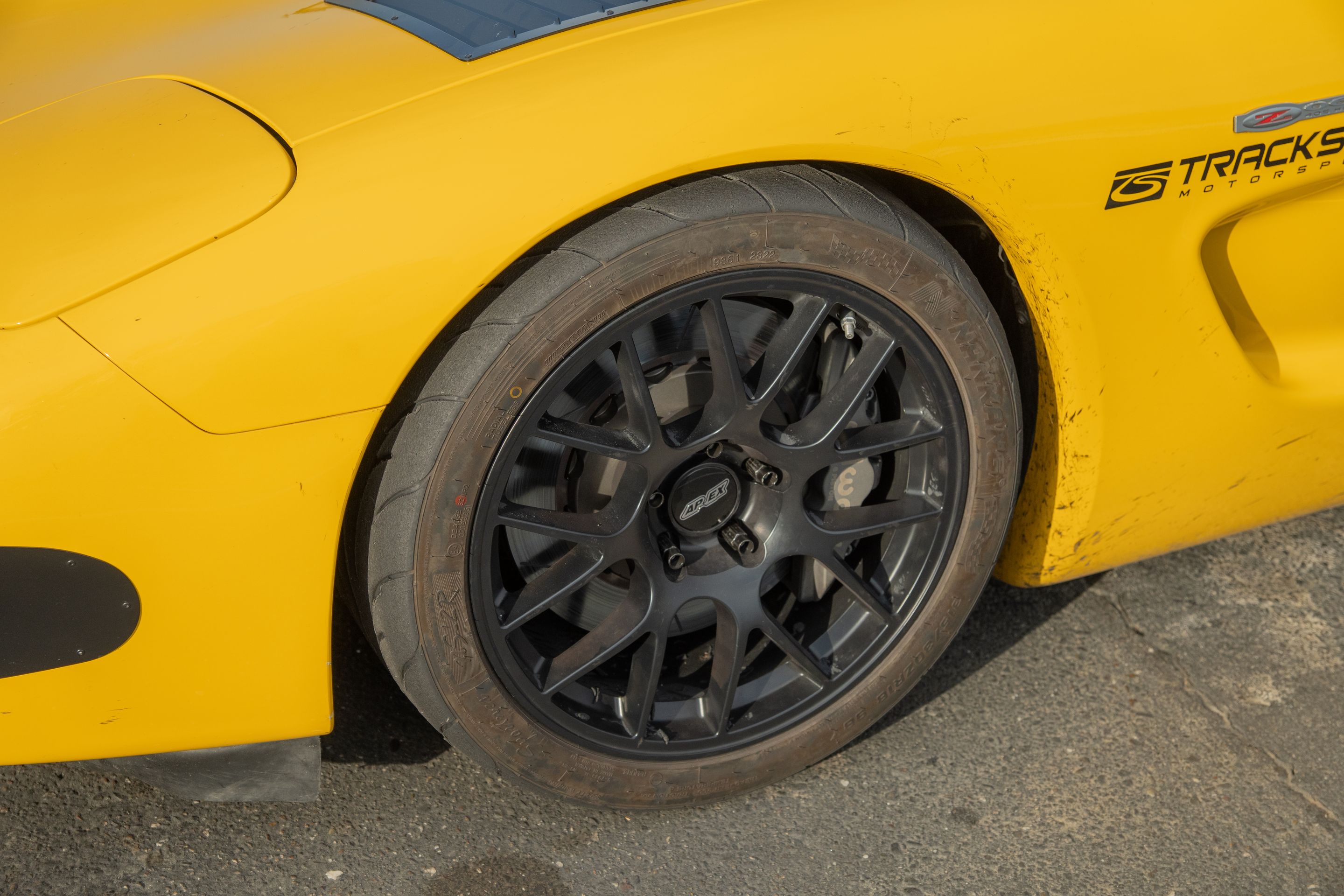 Yellow Chevrolet C5 Spec Corvette with 18" EC-7 Apex wheels in Satin Black