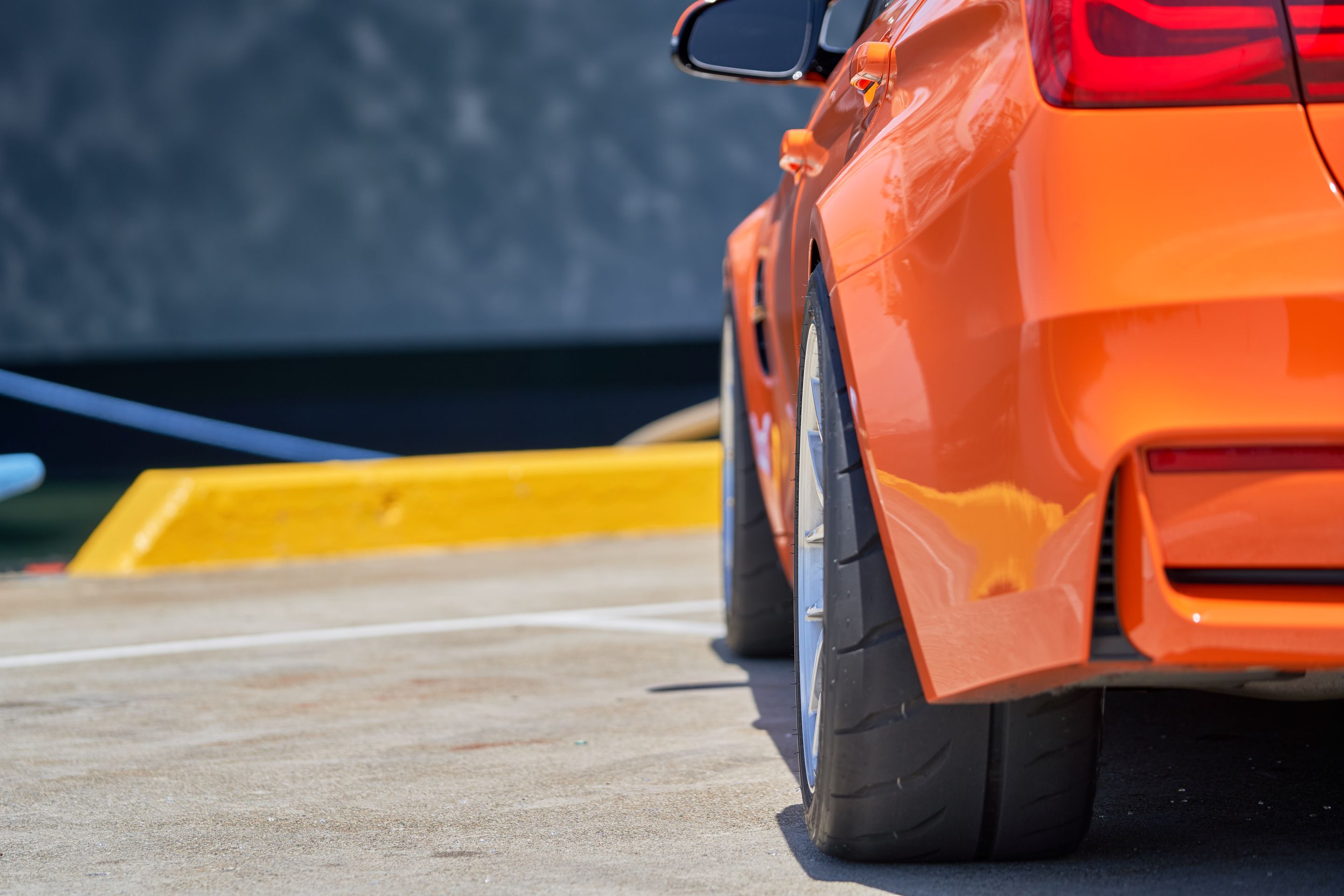 Orange BMW F80 M3 with 18" EC-7R Apex wheels in Brushed Clear