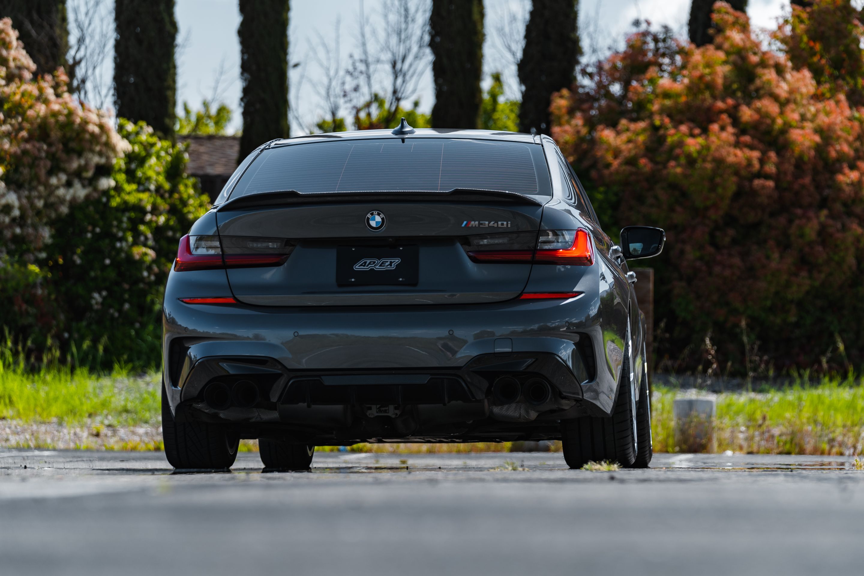 Grey BMW G20 Sedan 3 Series with 20" VS-5RS Apex wheels in Brushed Clear