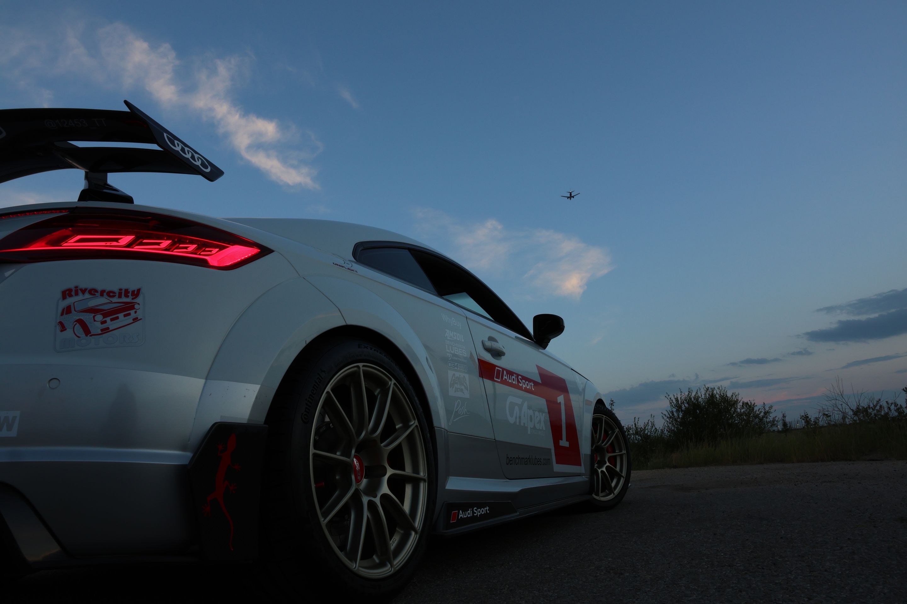 White Audi FV/8S TT RS with 18" SM-10RS Apex wheels in Motorsport Gold