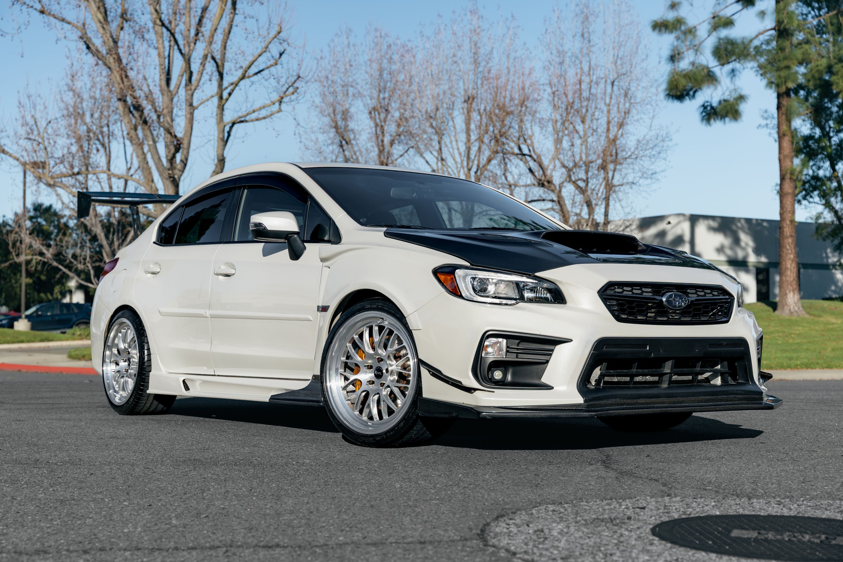 White Subaru VA WRX STI with 19" ML-10RT Apex wheels in Machined Lip Brushed Clear