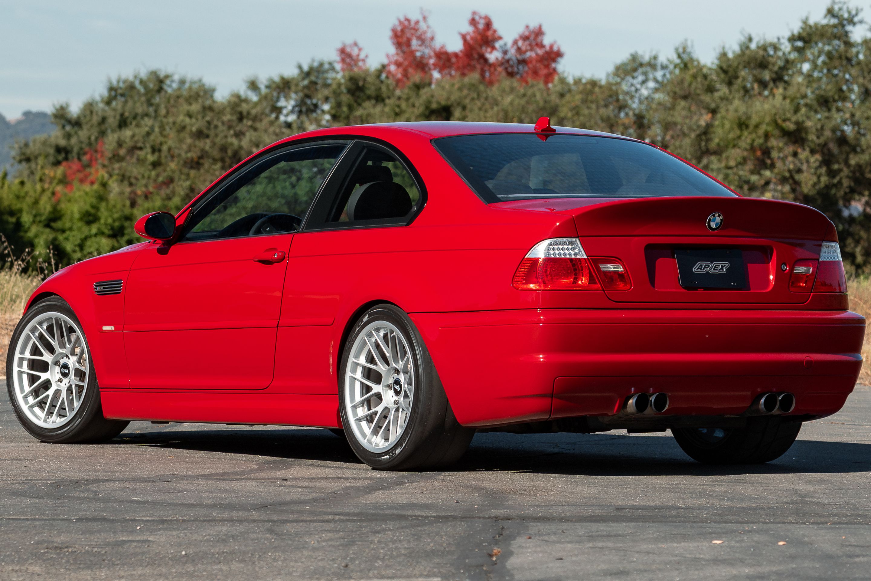 Red BMW E46 M3 with 18" ARC-8RT Apex wheels in Race Silver