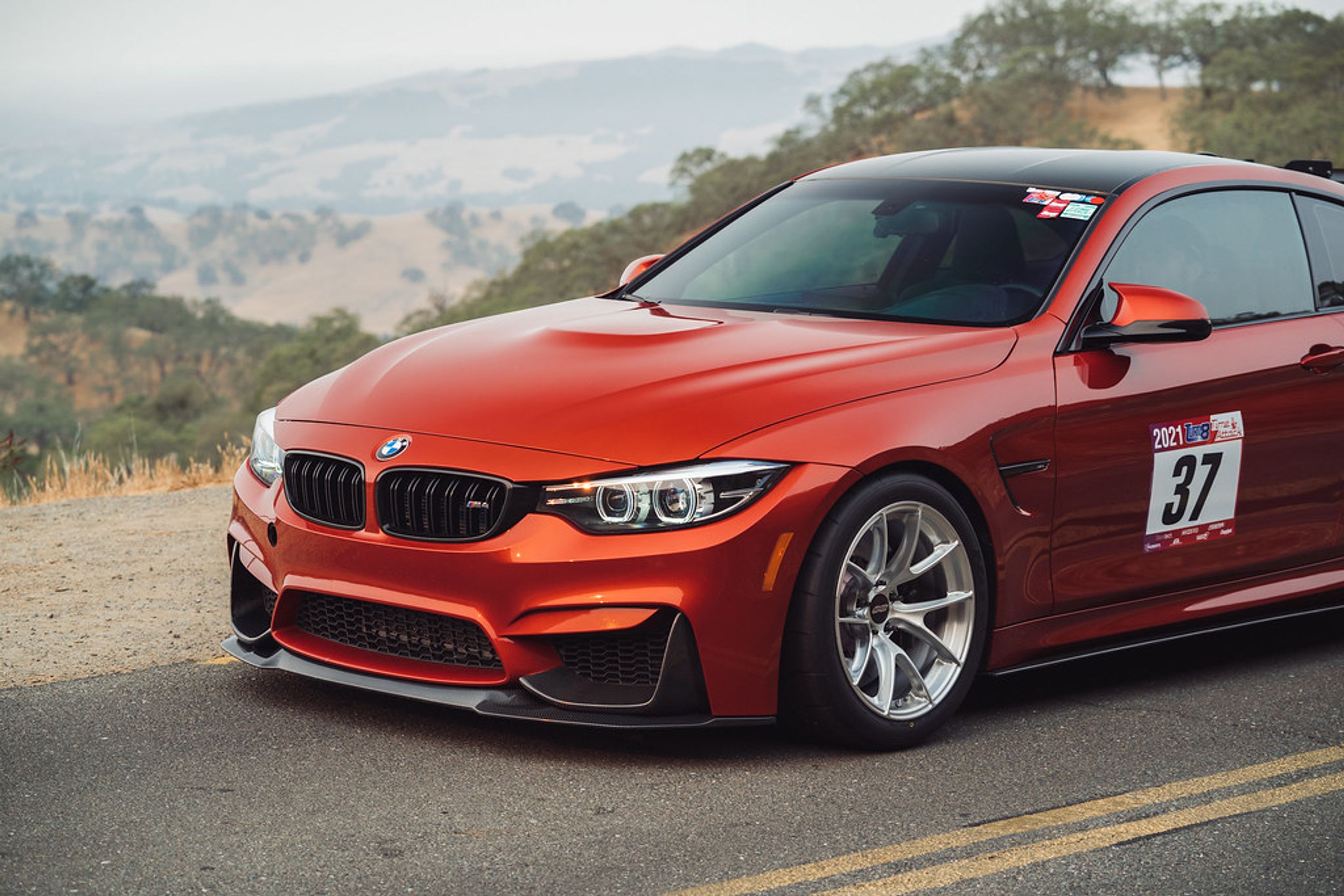 Orange BMW F82 Coupe M4 with 18" VS-5RS Apex wheels in Brushed Clear
