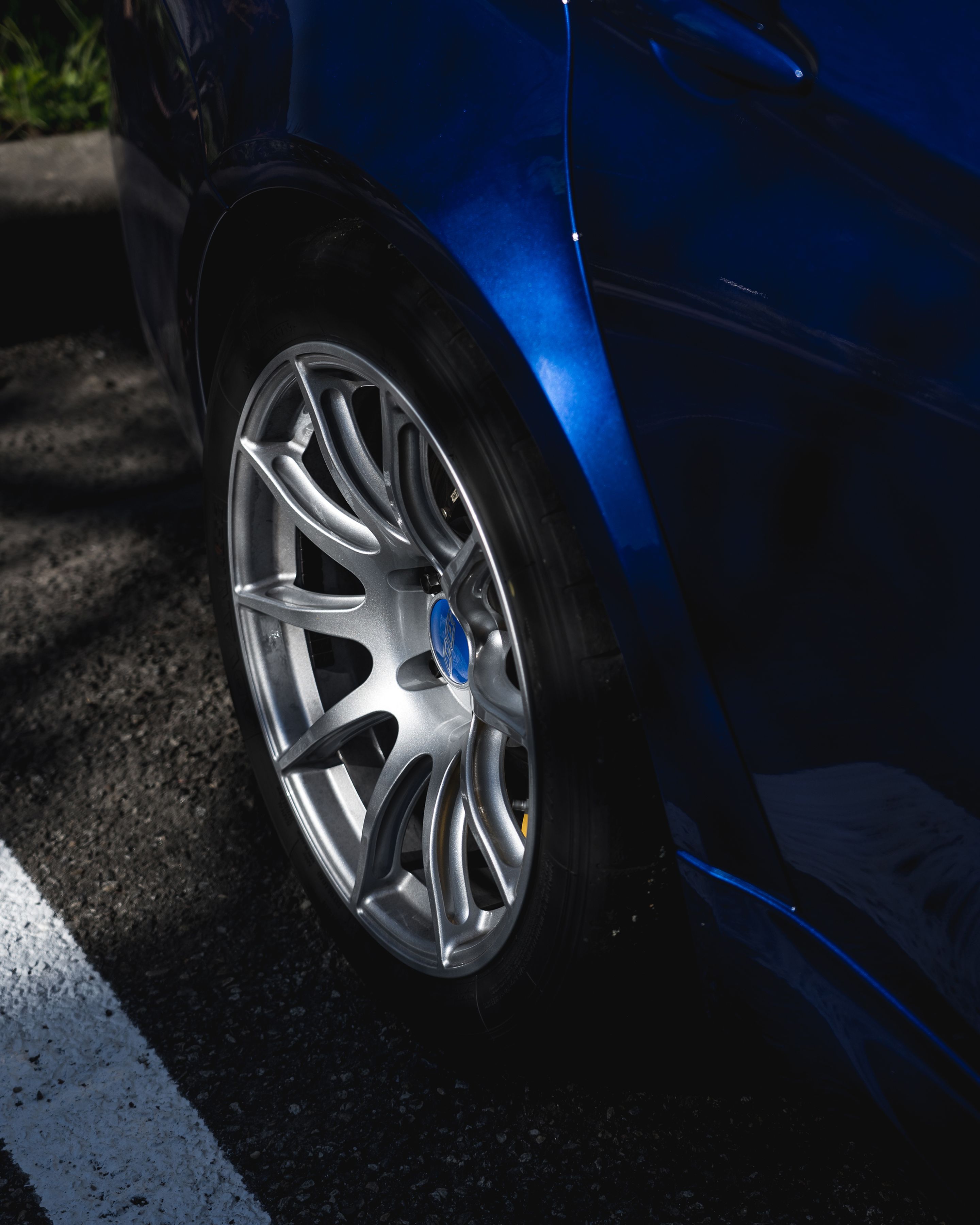 Blue BMW F80 M3 with 18" SM-10 Apex wheels in Race Silver