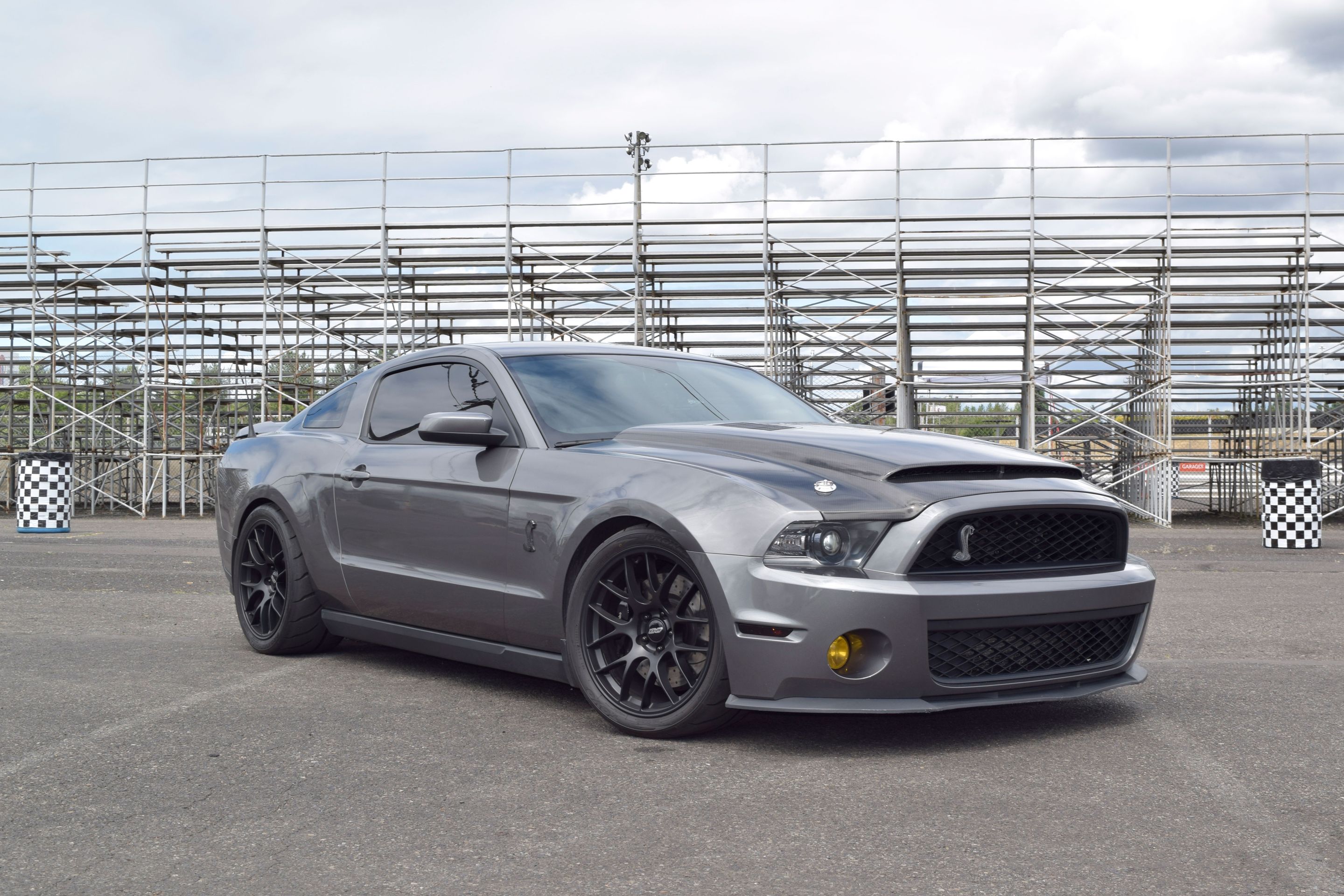 Grey Ford S197 Mustang GT500 with 19" EC-7 Apex wheels in Satin Black
