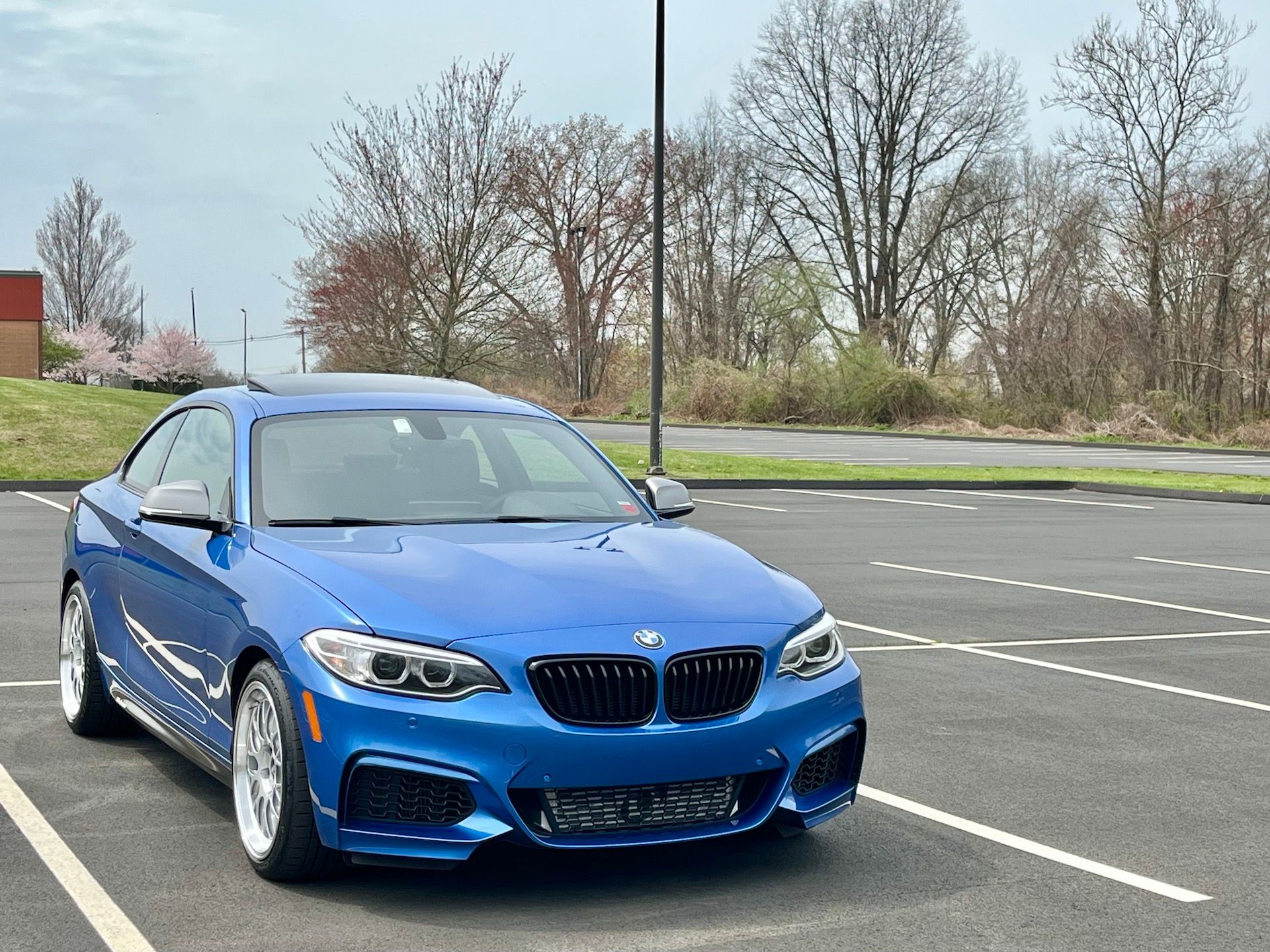 Blue BMW F22 Coupe 2 Series with 18" ML-10RT Apex wheels in Machined Lip Race Silver