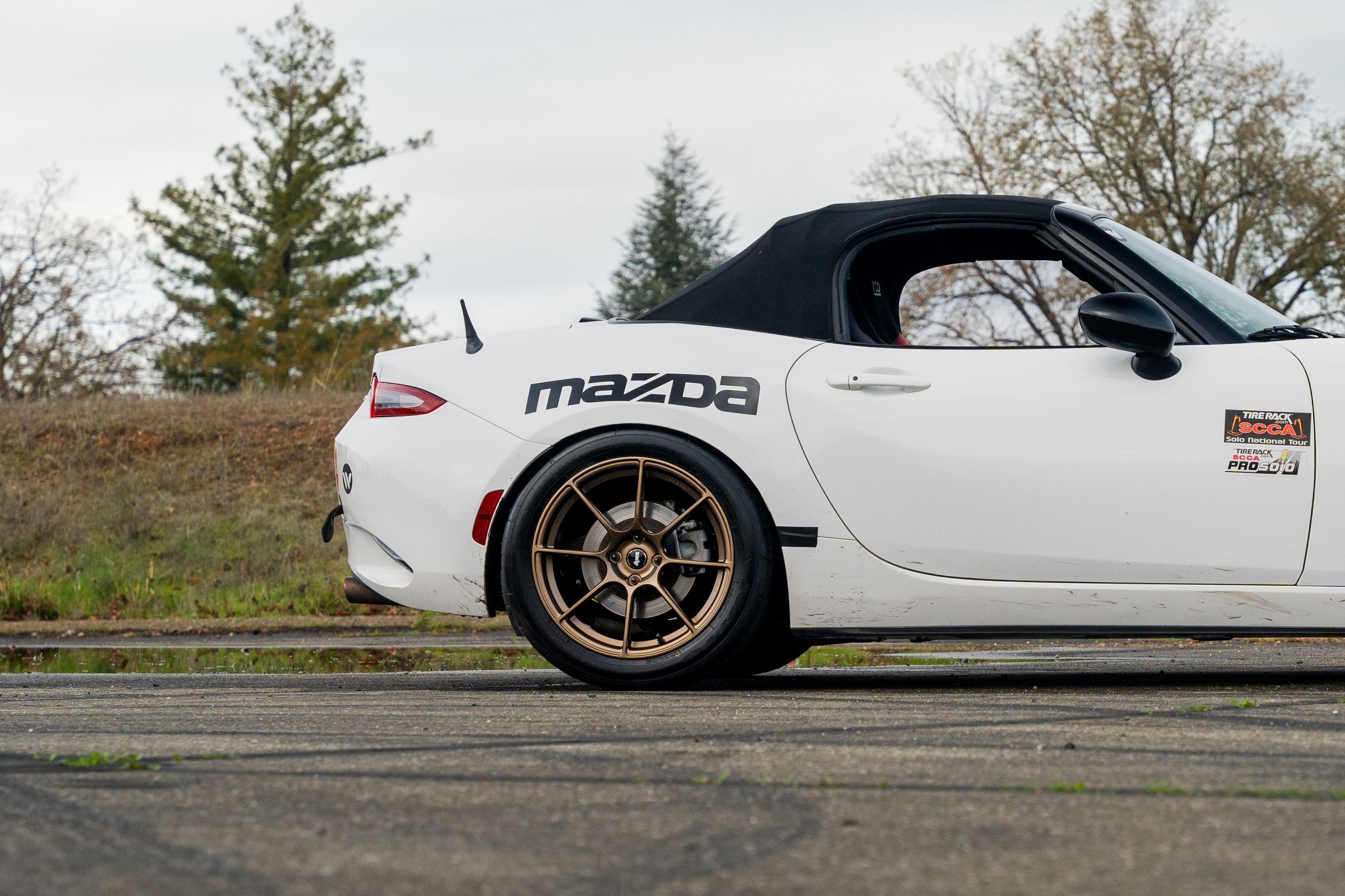 White Mazda ND MX-5 Miata with 17" SM-8RS Apex wheels in Satin Bronze