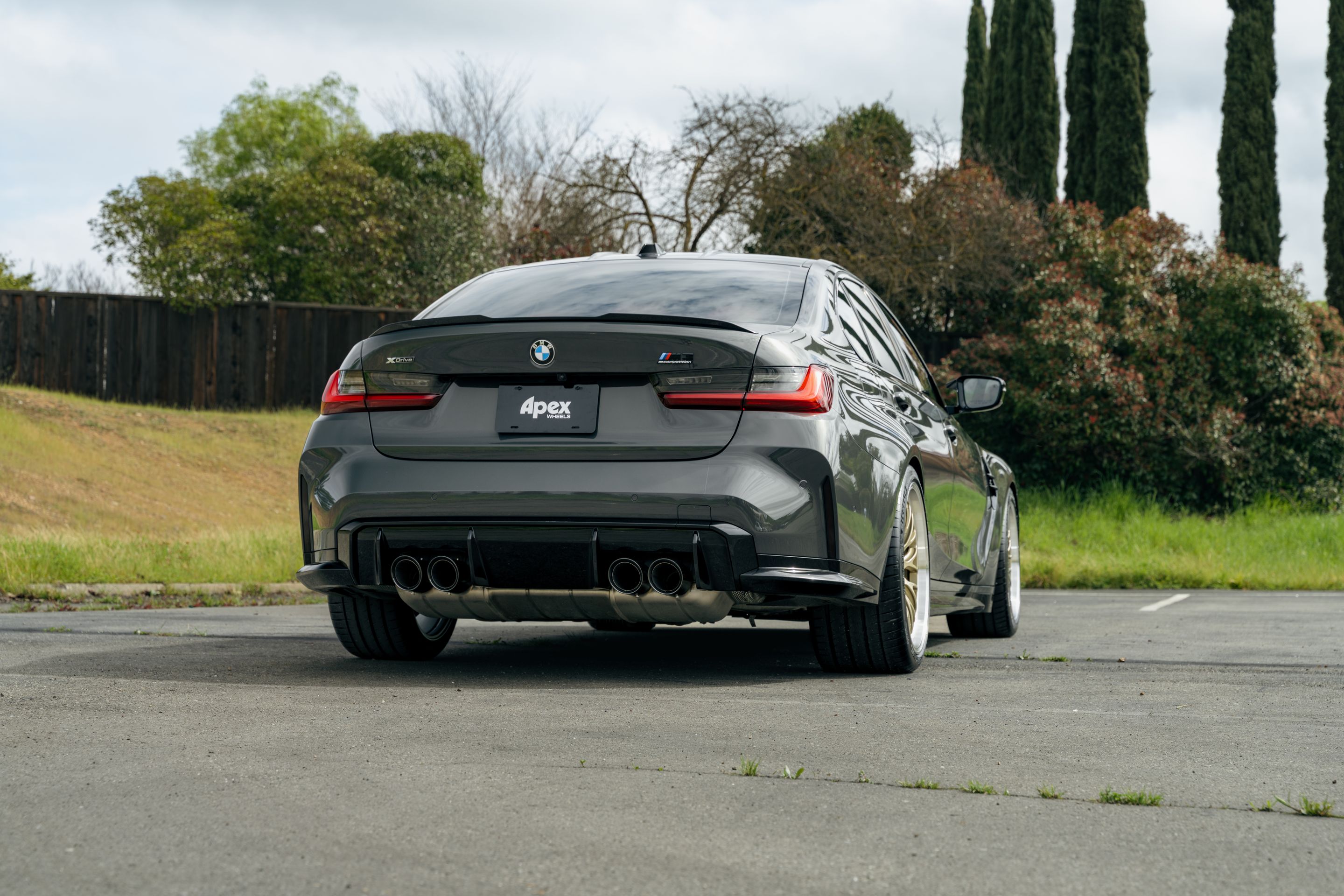 Grey BMW G80 M3 with 19"/20" ML-10RT Apex wheels in Machined Lip Gloss Motorsport Gold