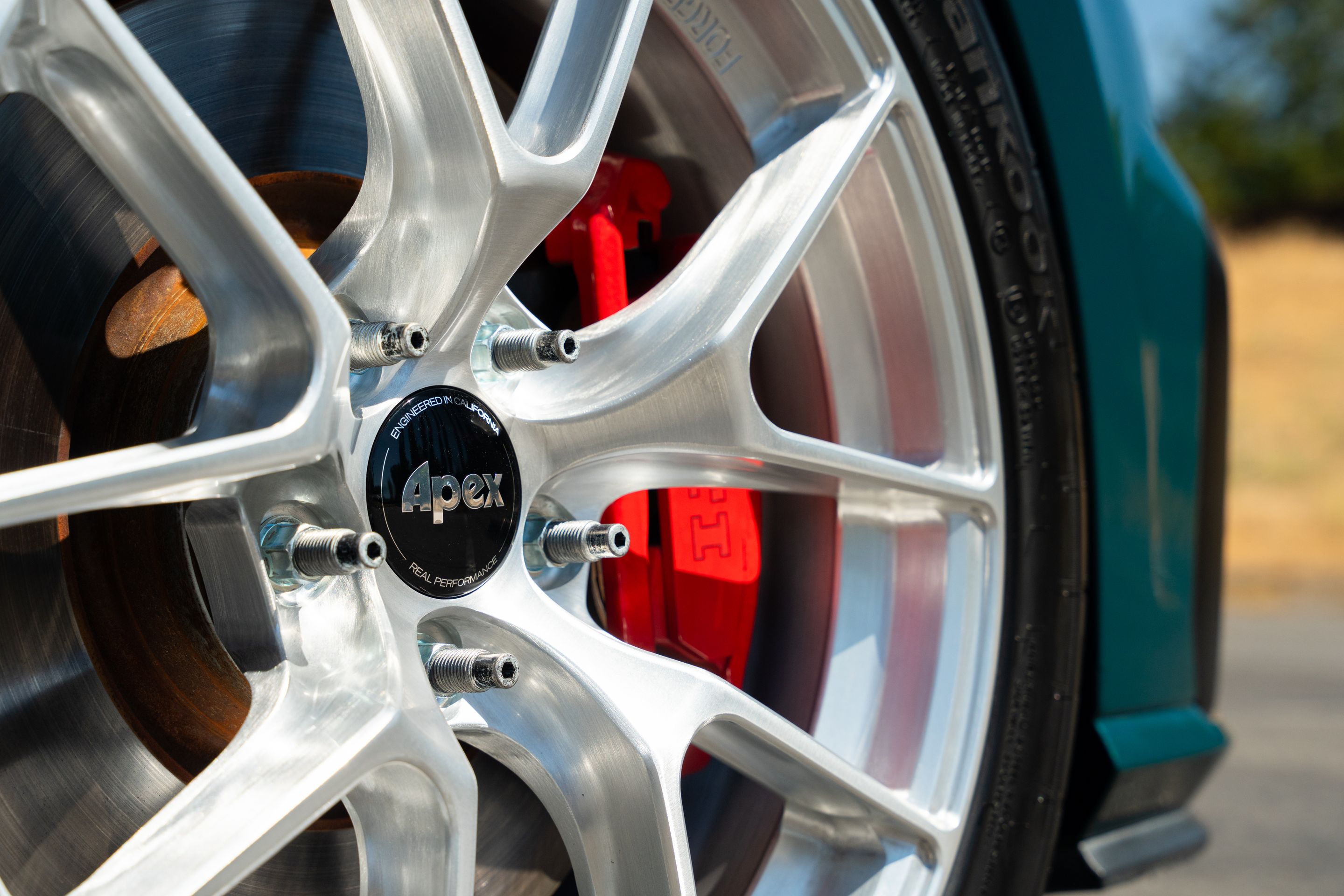 Green VW MK7 GTI with 17" VS-5RS Apex wheels in Brushed Clear