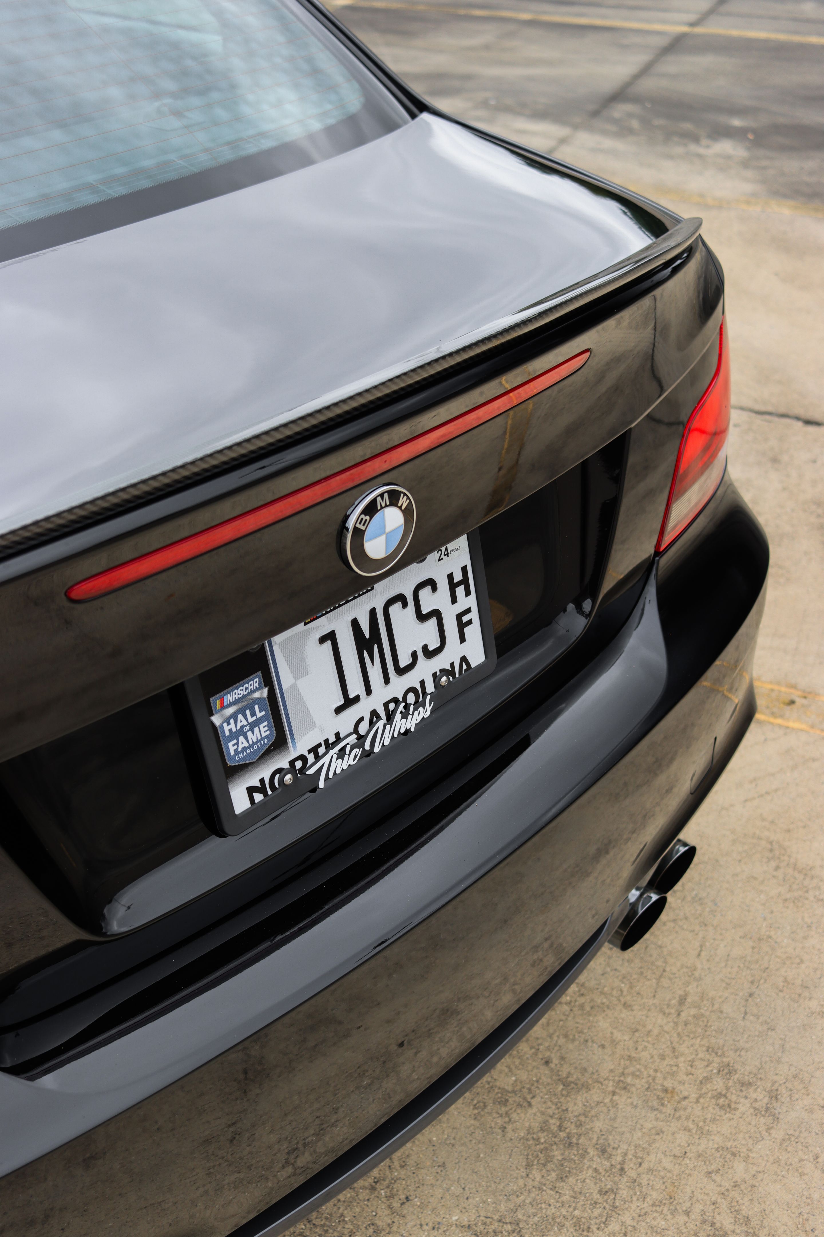 Black BMW E82 1M with 18" VS-5RS Apex wheels in Satin Black