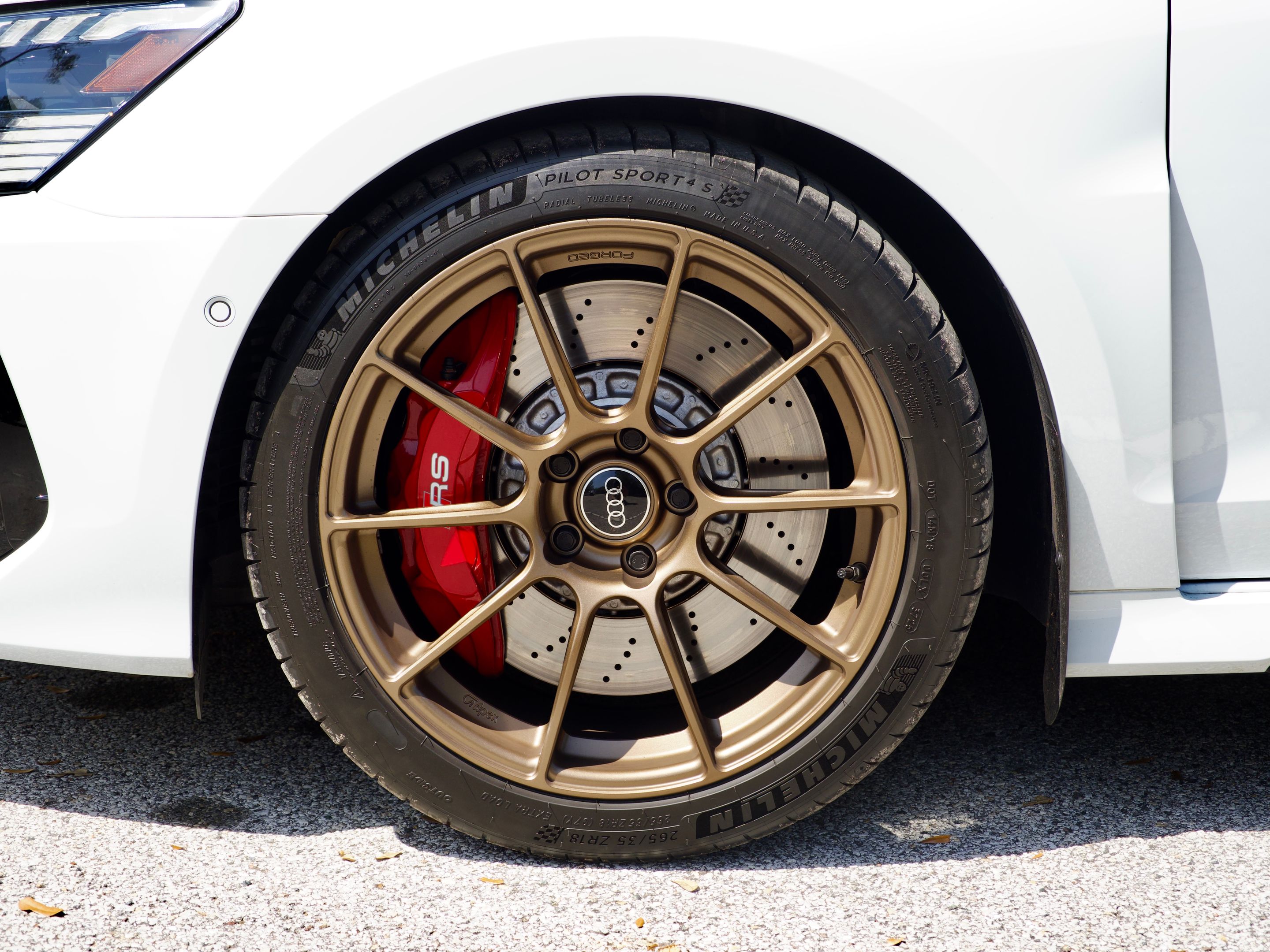 White Audi 8Y RS 3 with 18" SM-10RS Apex wheels in Satin Bronze