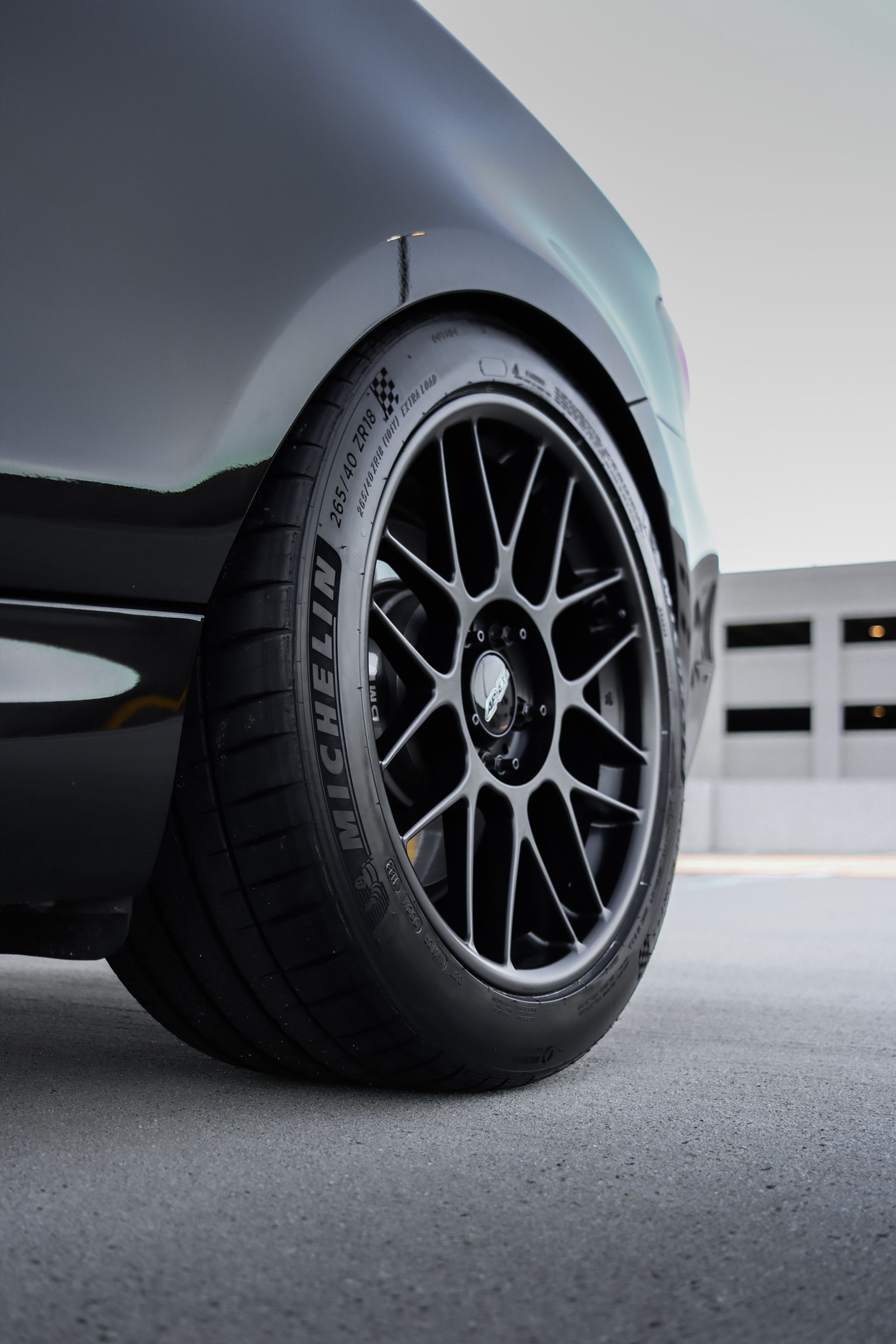 Black BMW E82 Coupe 1 Series with 18" ARC-8 Apex wheels in Satin Black