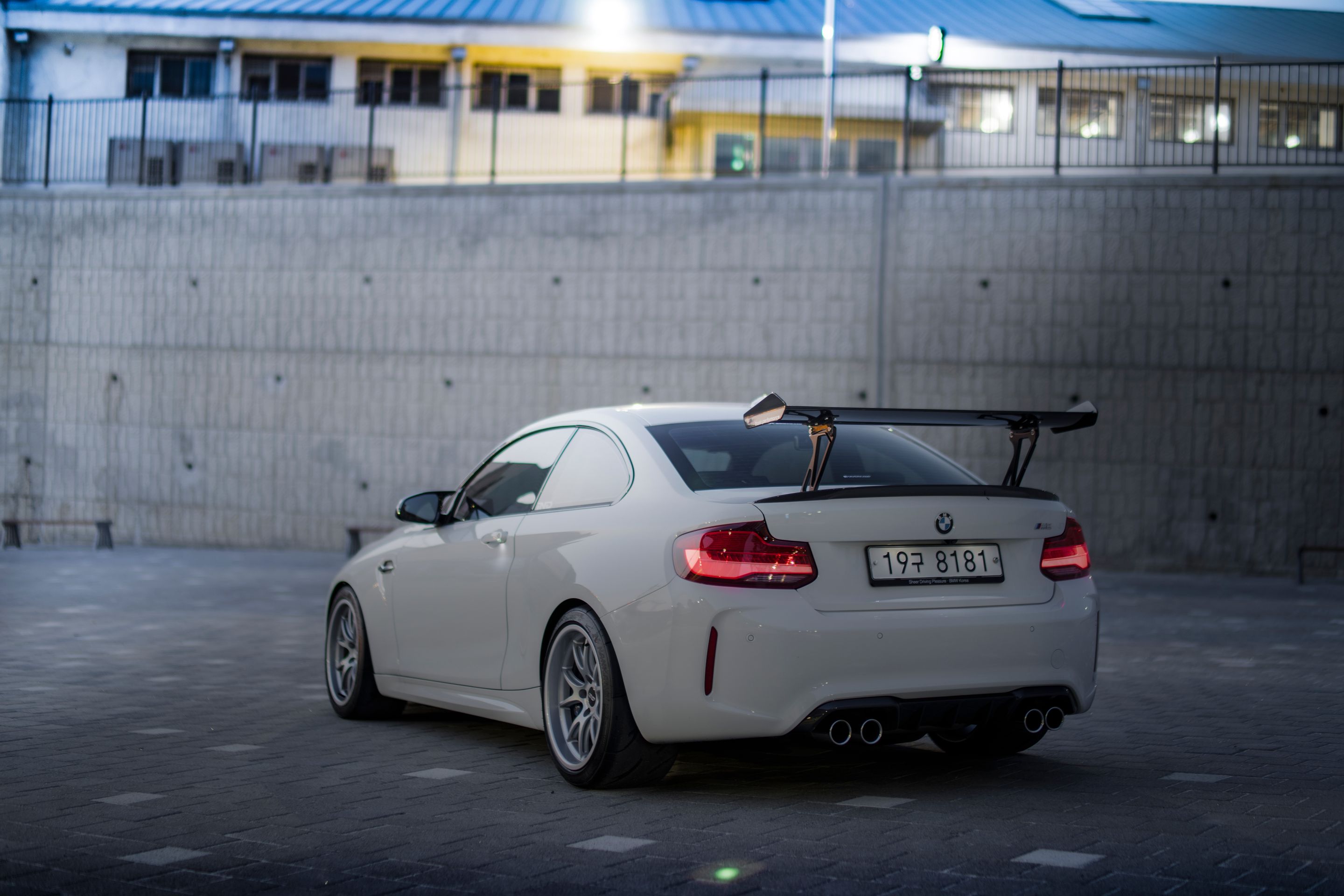 White BMW F87 M2 with 18" FL-5 Apex wheels in Race Silver