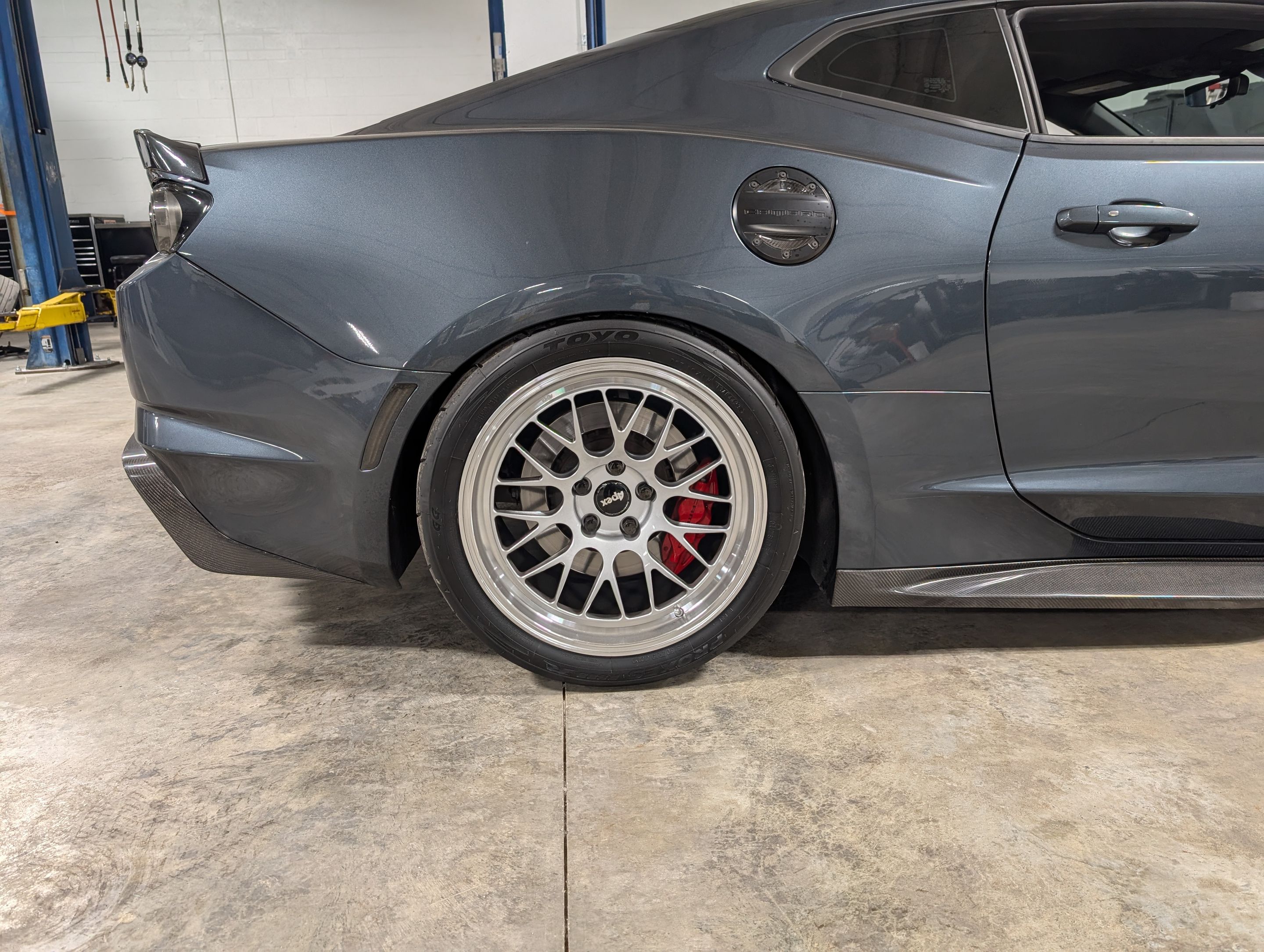 Grey Chevrolet 6th Gen Camaro SS with 19" ML-10RT Apex wheels in Machined Lip Race Silver
