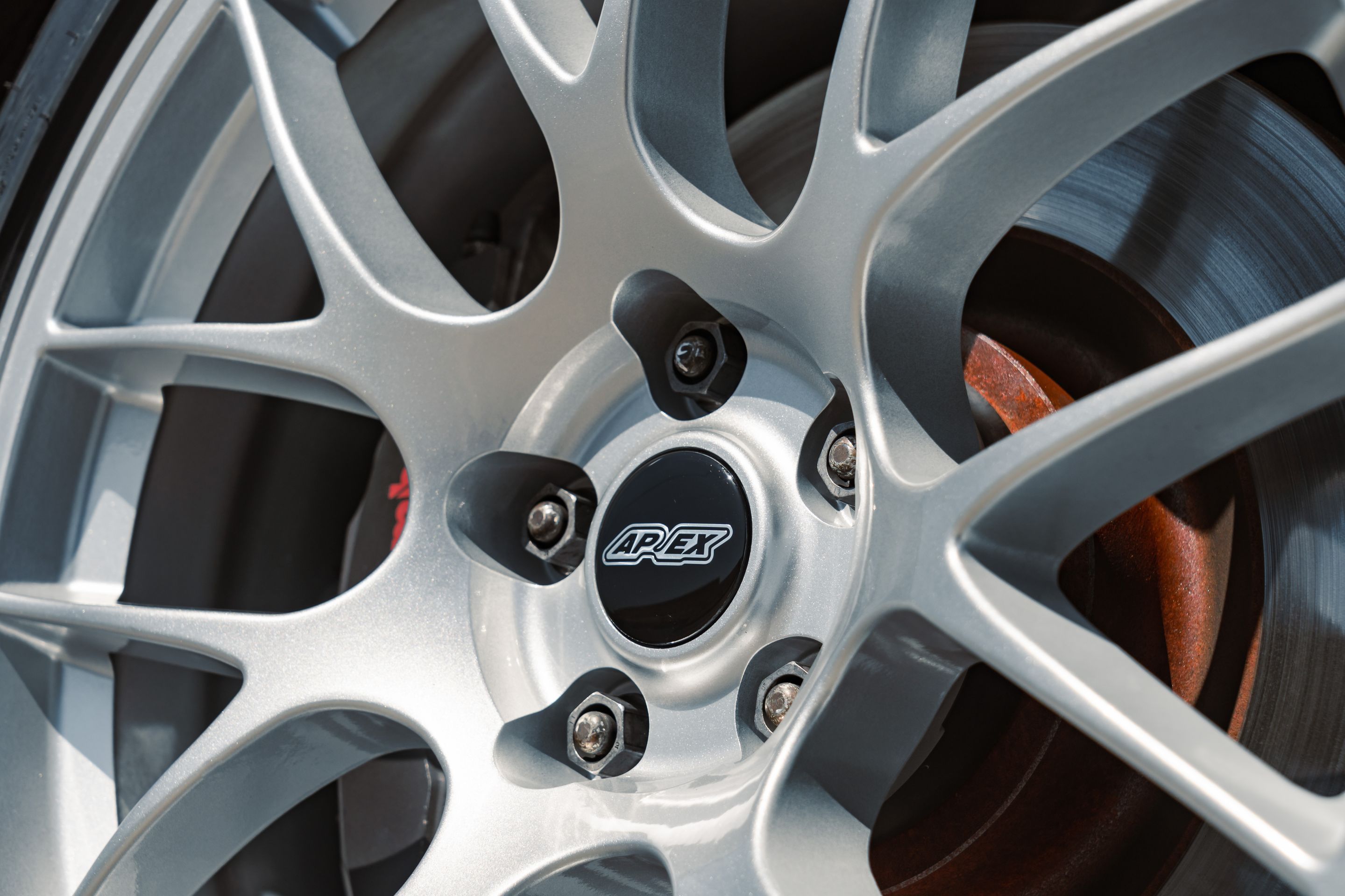 Red Ford S550 Mustang GT with 19" EC-7 Apex wheels in Race Silver