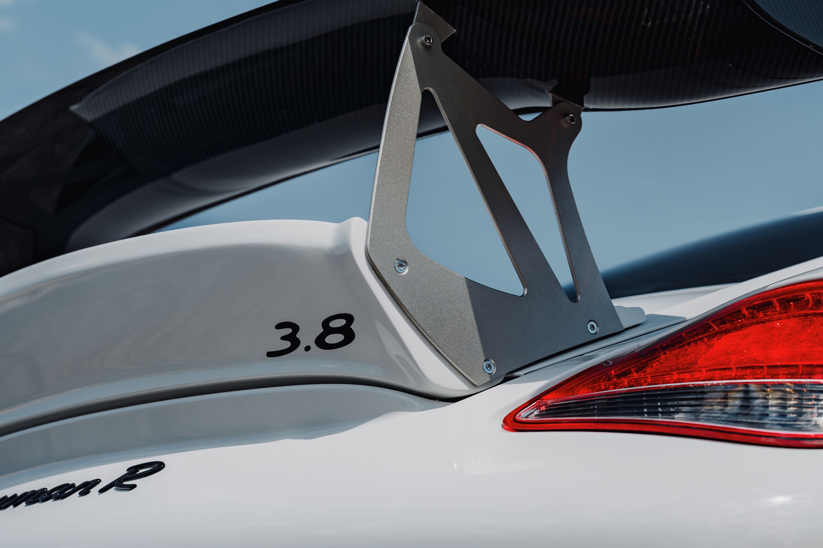 White Porsche 987 Cayman R with 18" EC-7RS Apex wheels in Race Silver