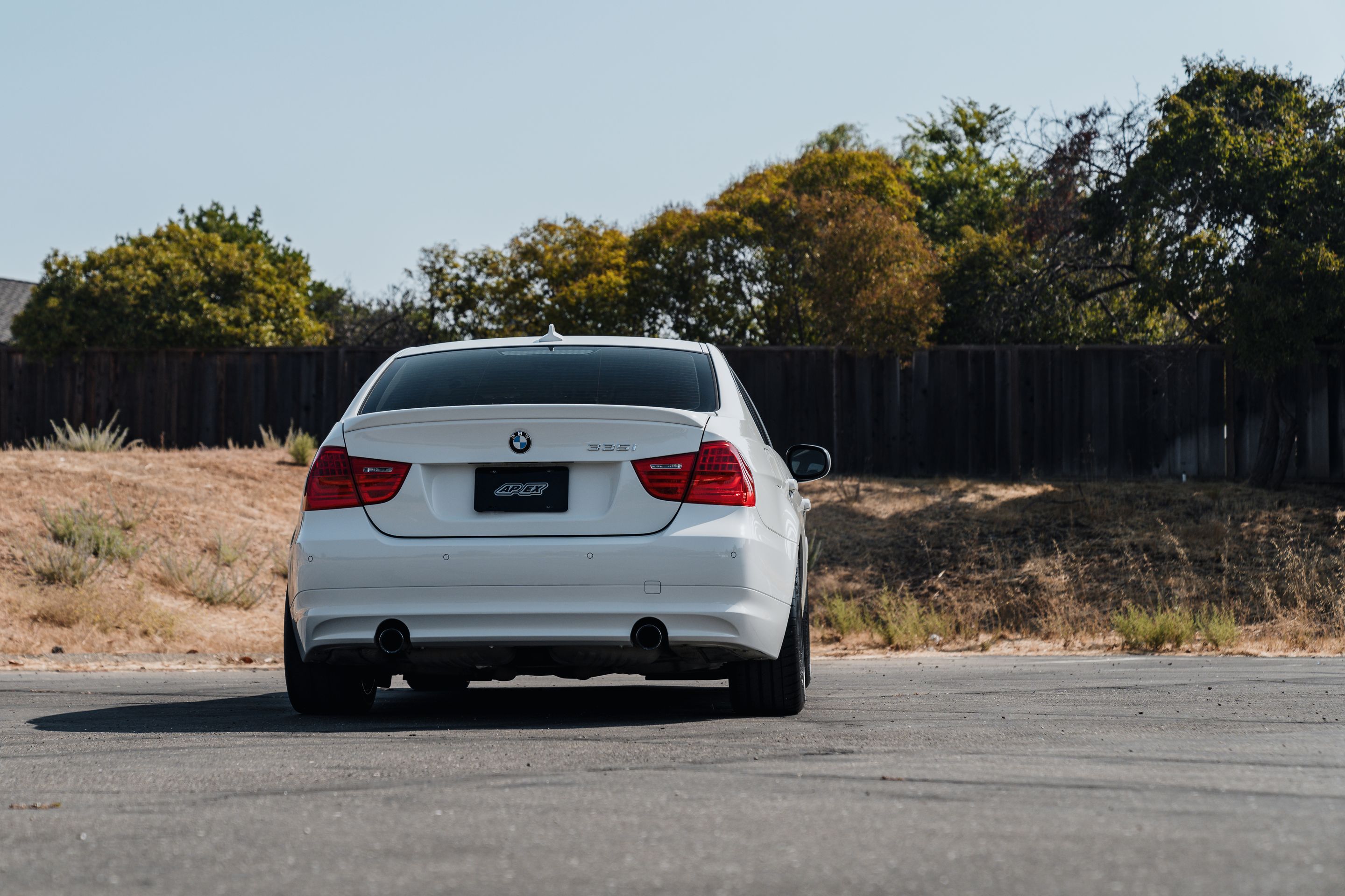 White BMW E90 LCI Sedan 3 Series with 19" ARC-8RT Apex wheels in Satin Black