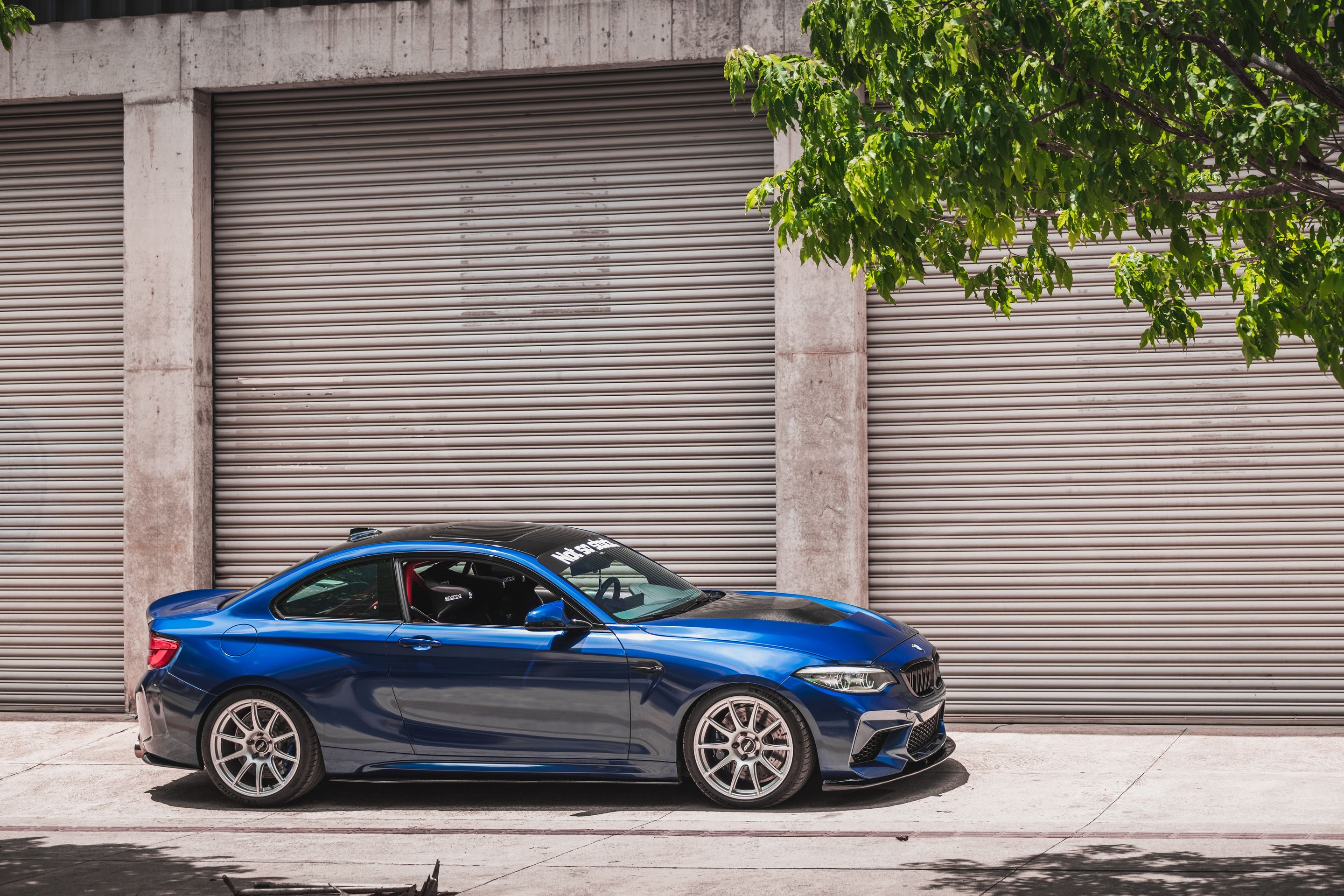 Blue BMW F87 M2 with 19" SM-10 Apex wheels in Race Silver