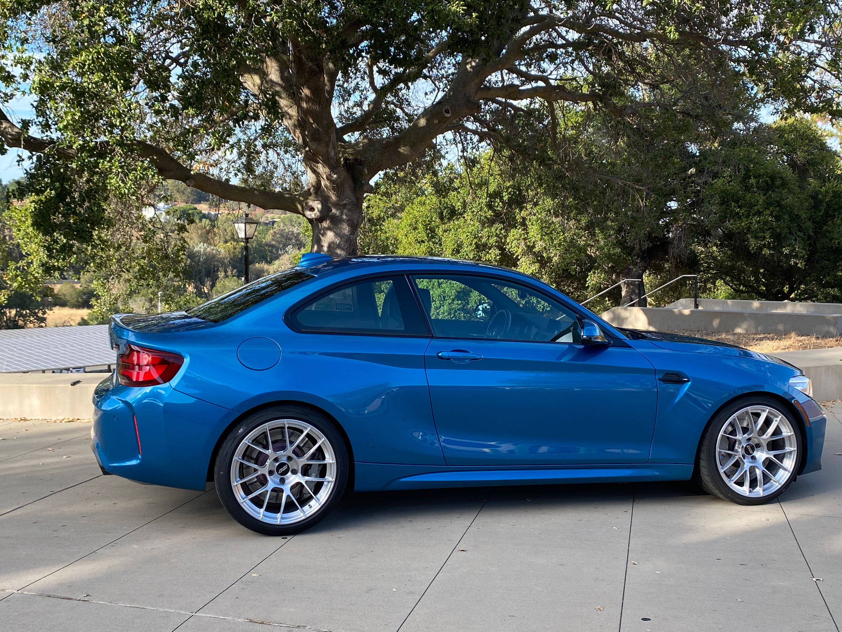 Blue BMW F87 M2 with 19" EC-7RS Apex wheels in Brushed Clear