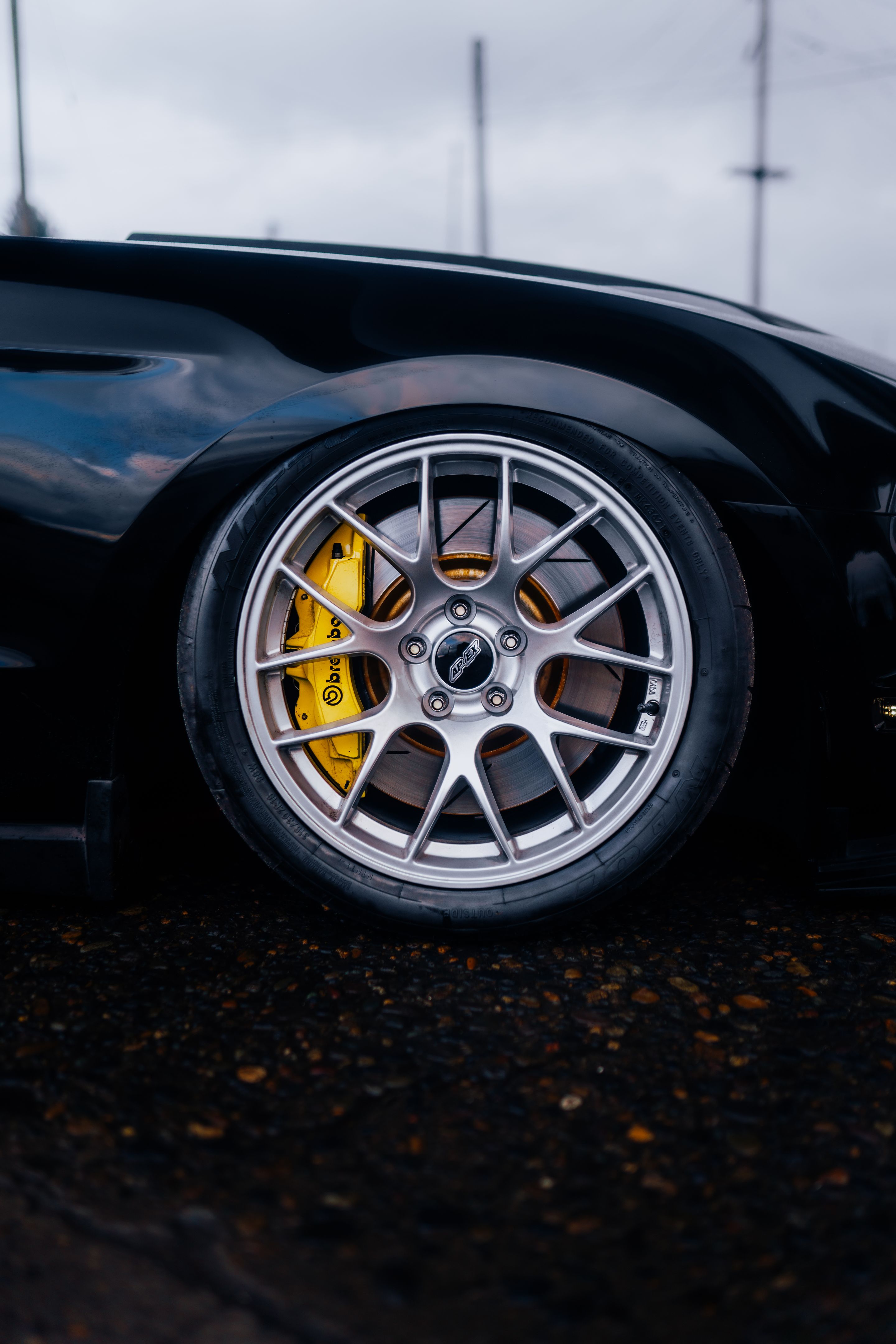 Black Ford S197 Mustang GT with 18" EC-7 Apex wheels in Race Silver