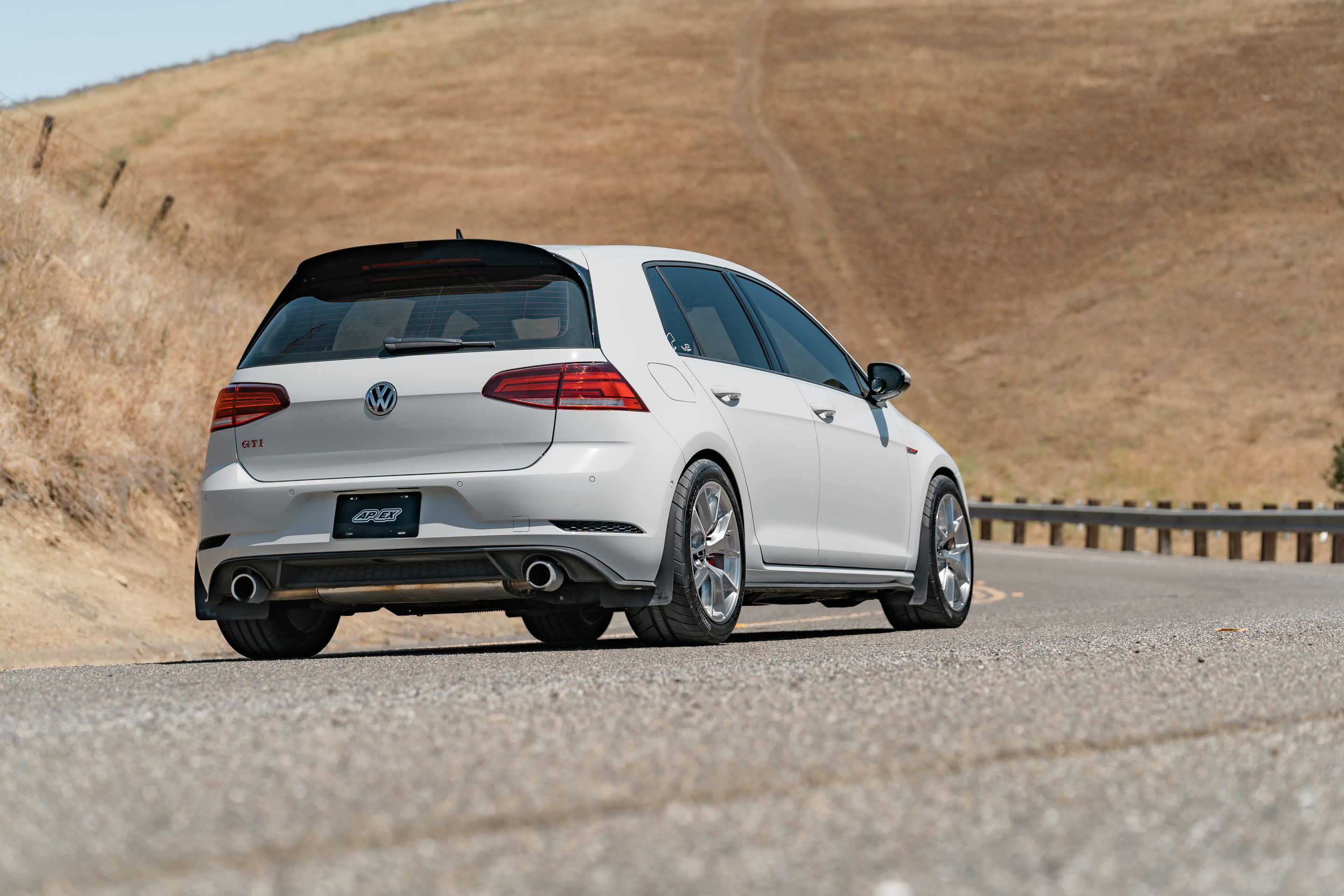 White VW MK7 GTI with 17" VS-5RS Apex wheels in Brushed Clear