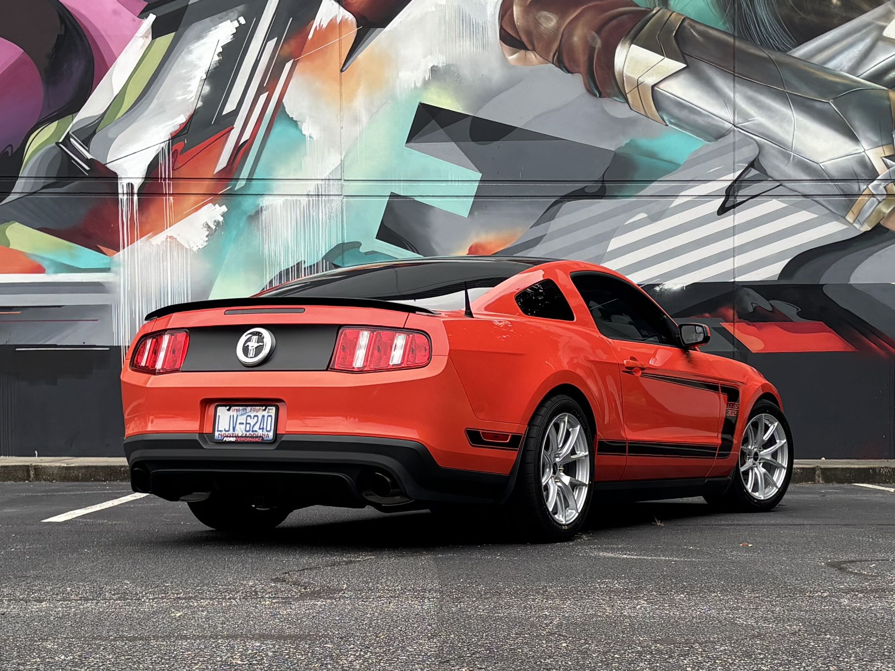 Red Ford S197 Mustang Boss 302 with 18" VS-5 Apex wheels in Race Silver
