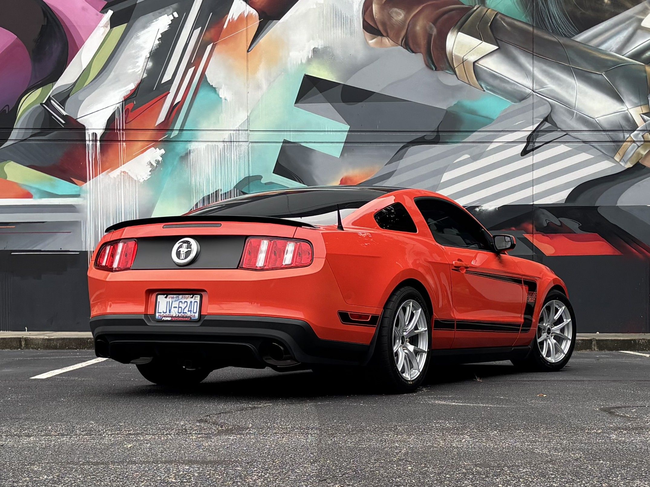 Red Ford S197 Mustang Boss 302 with 18" VS-5 Apex wheels in Race Silver