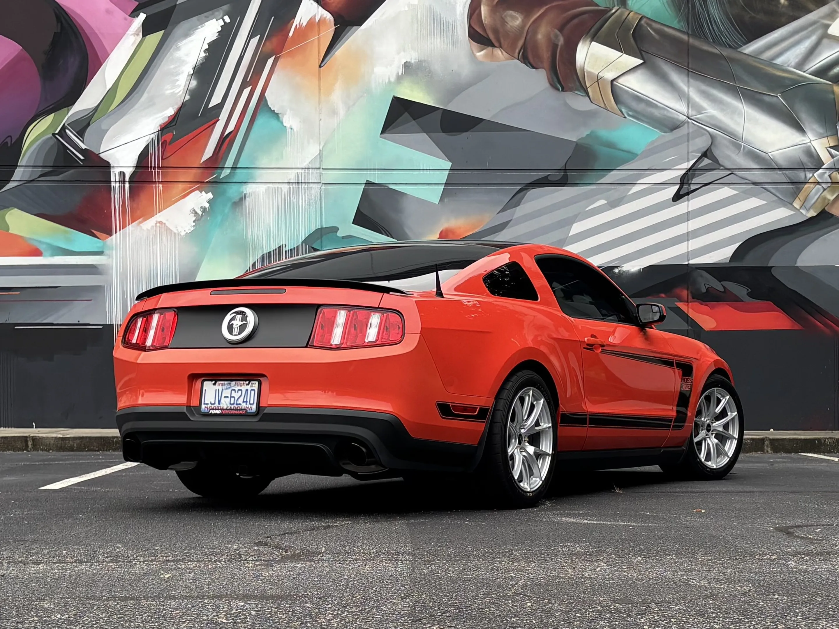 Red Ford S197 Mustang Boss 302 with 18" VS-5 Apex wheels in Race Silver