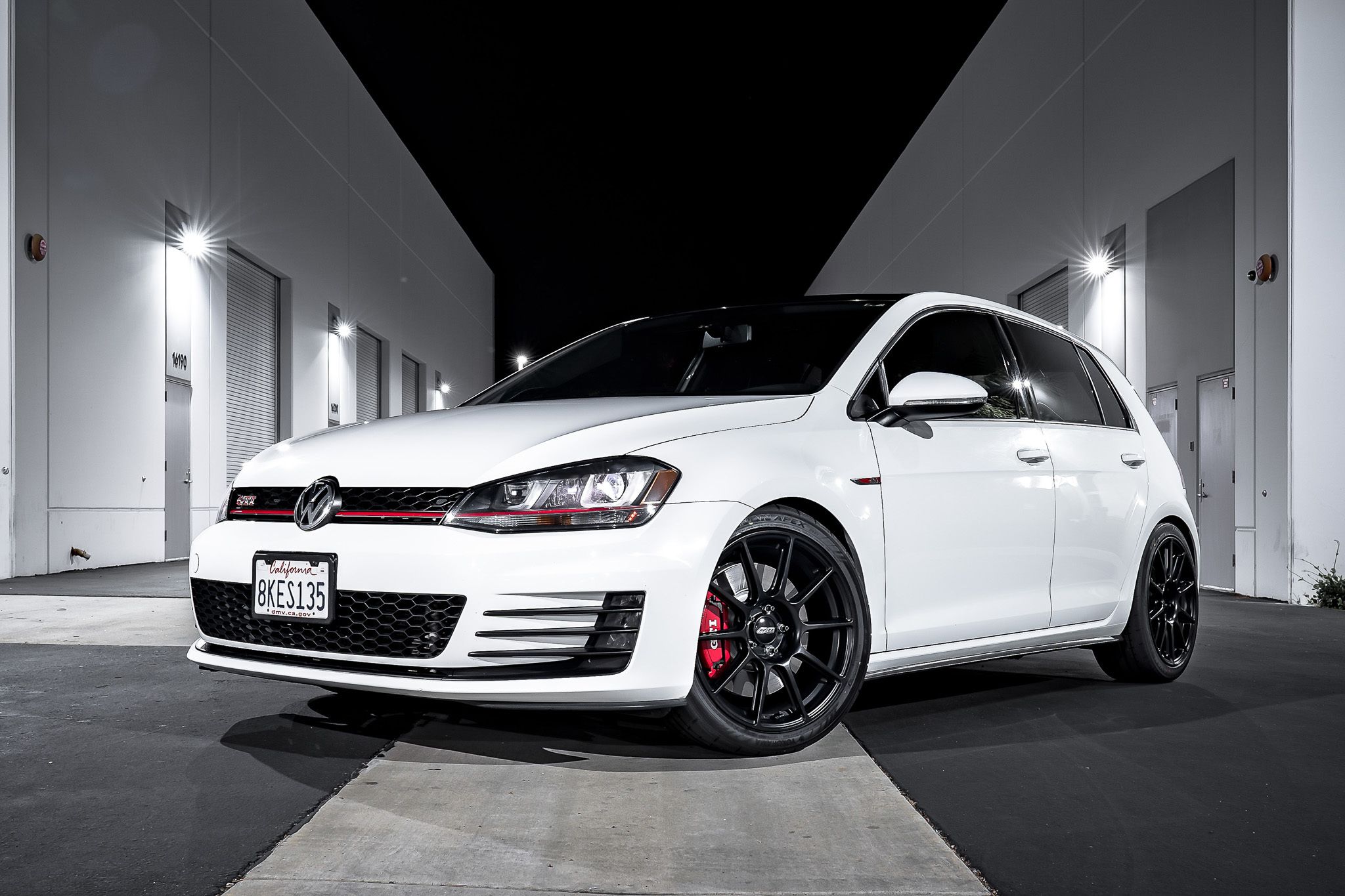 White VW MK7 GTI with 18" SM-10 Apex wheels in Satin Black