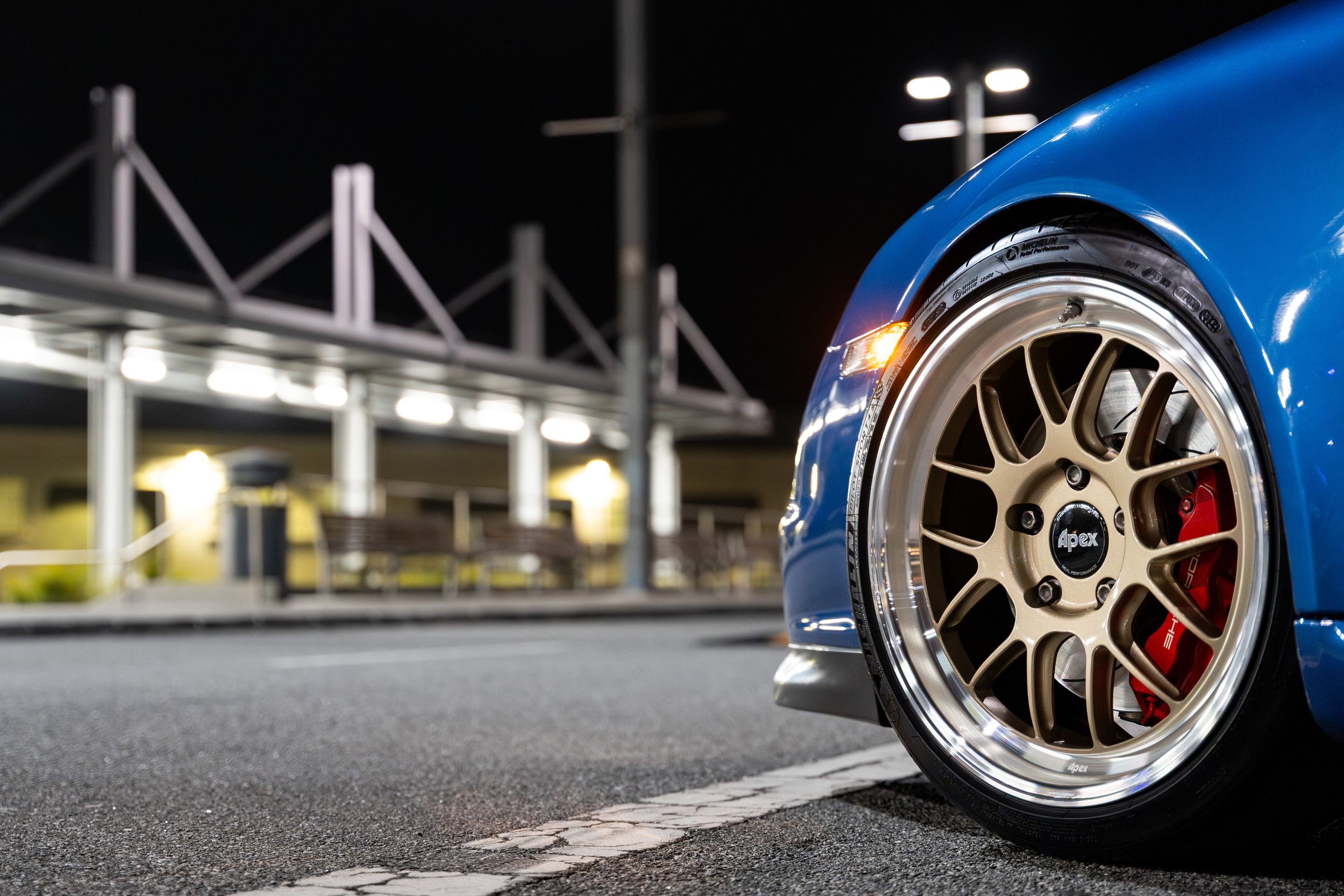 Blue Porsche 911 997 GT3 with 19" TEST-M Apex wheels in Machined Lip Gloss Motorsport Gold