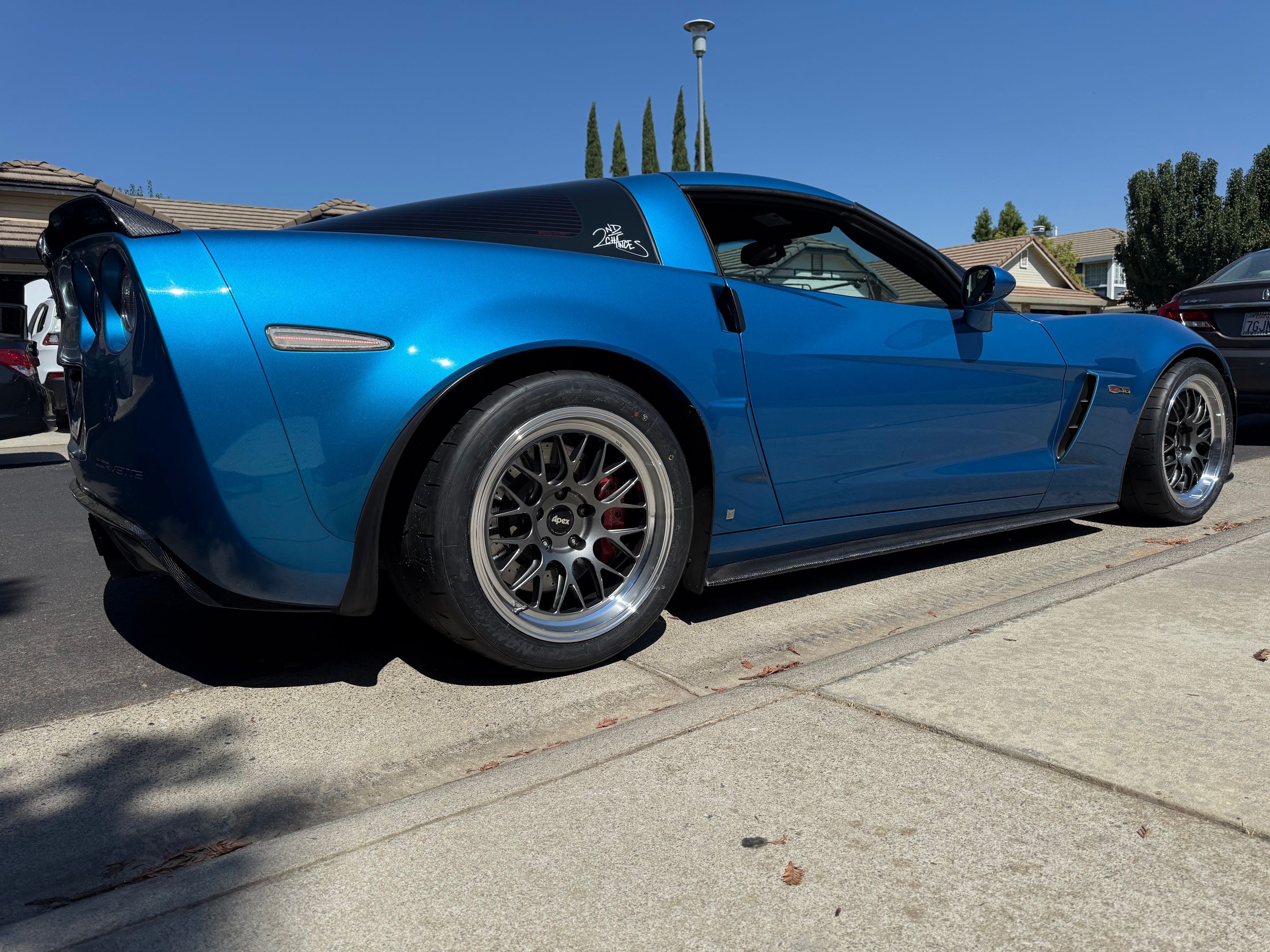 Blue Chevrolet C6 Corvette Z06 with 18" ML-10RT Apex wheels in Machined Lip Anthracite