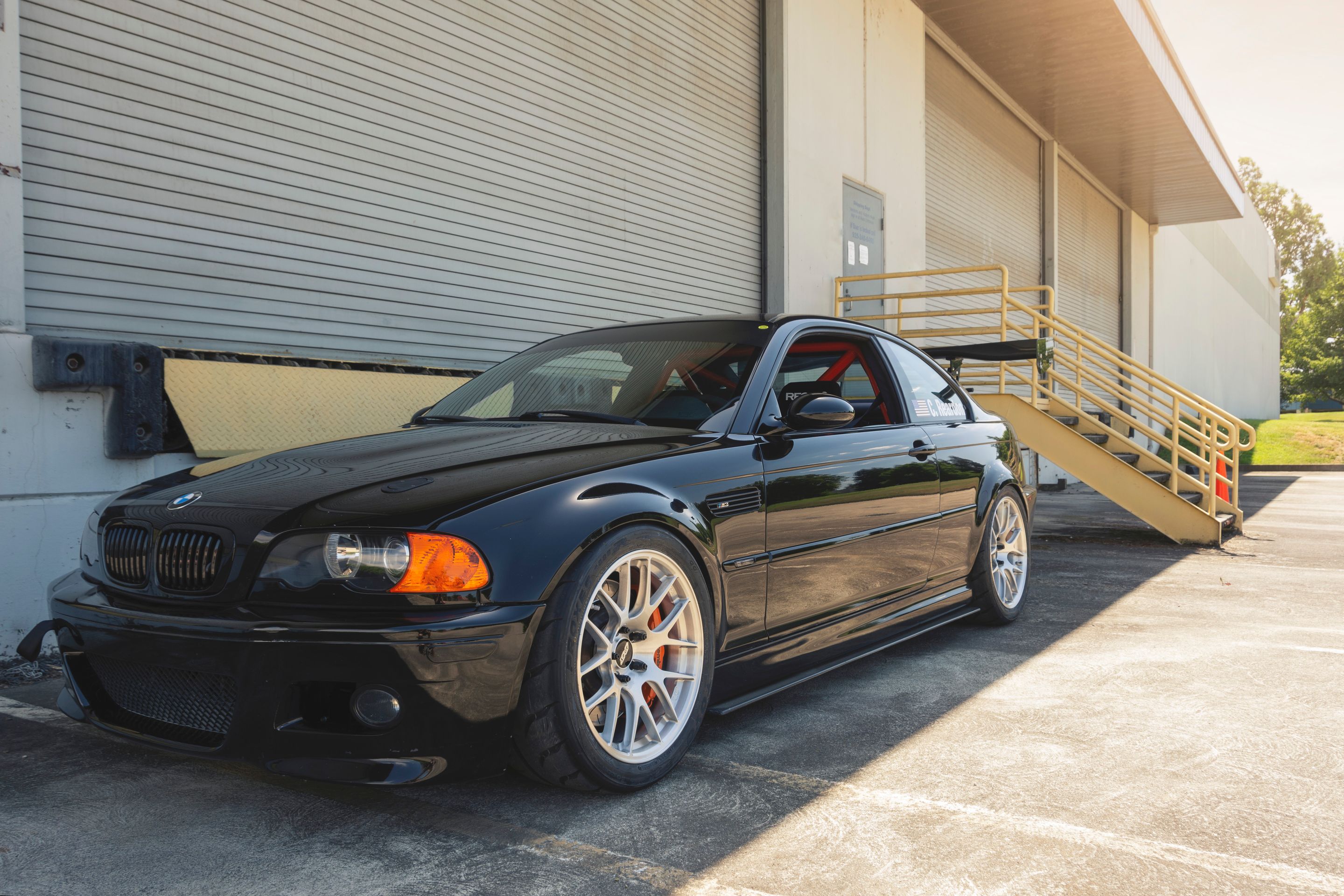 Black BMW E46 M3 with 18" EC-7R Apex wheels in Brushed Clear