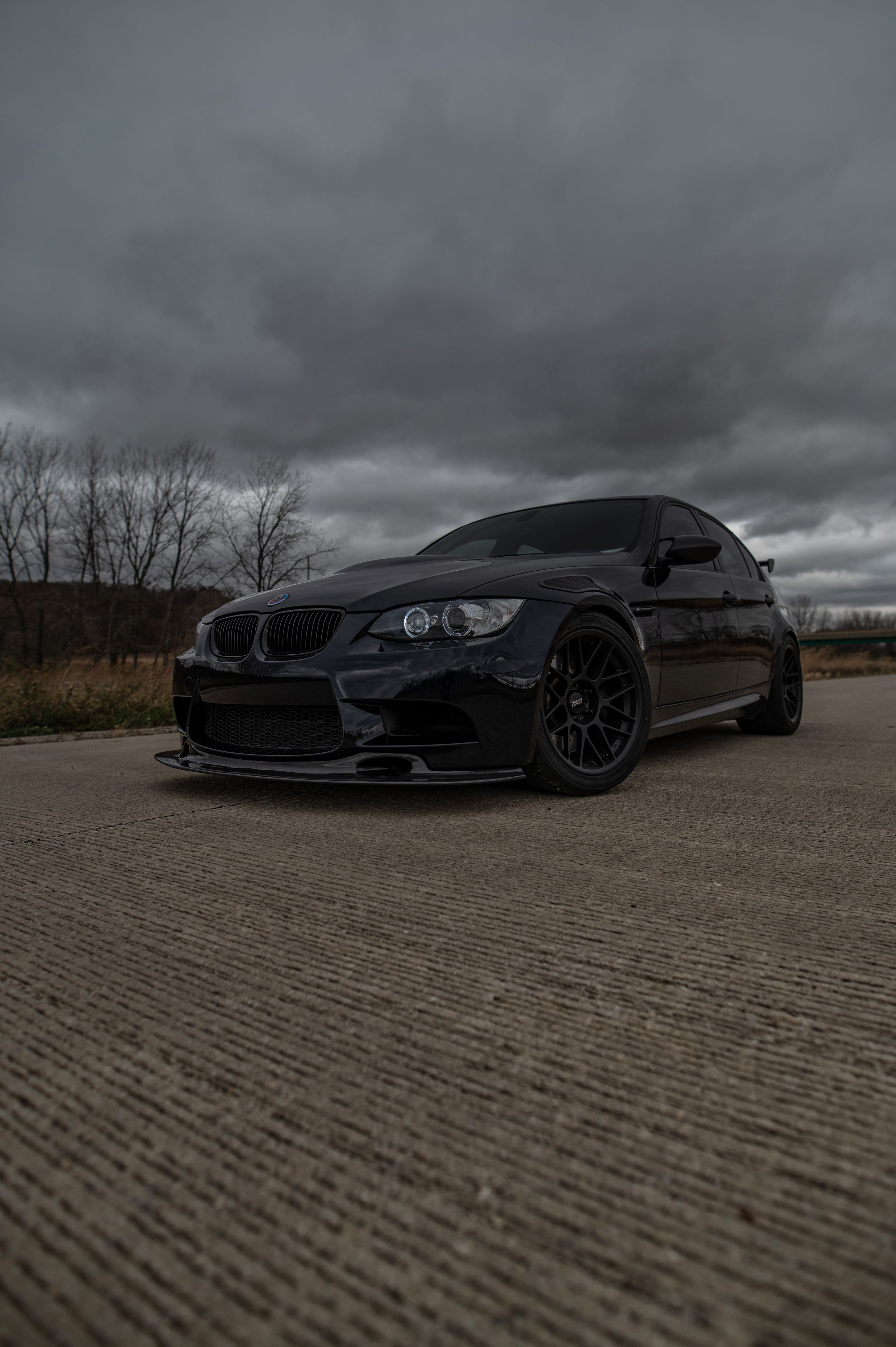 Black BMW E90 Sedan M3 with 18" ARC-8 Apex wheels in Satin Black