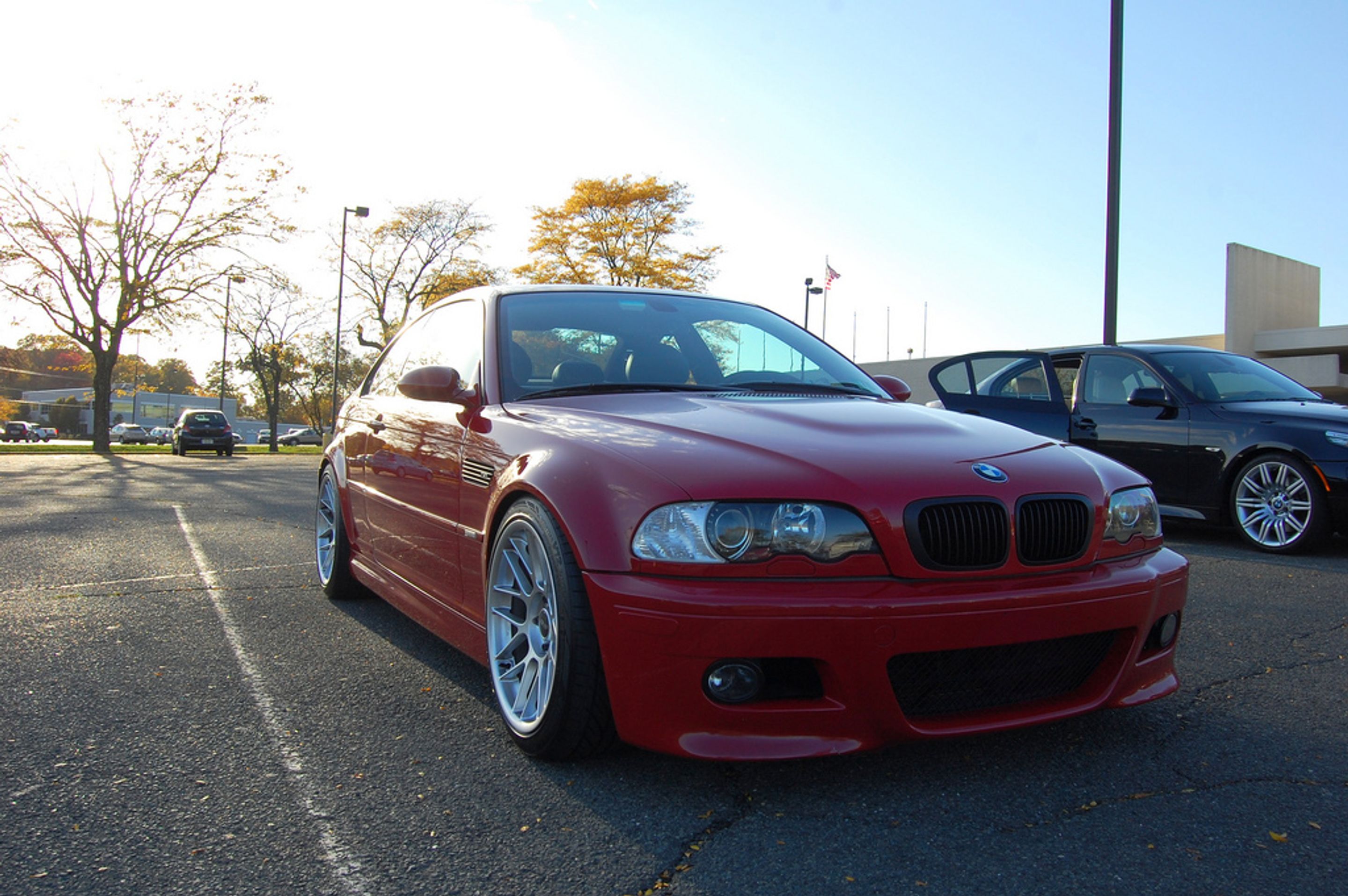 Red BMW E46 M3 with 18" ARC-8 Apex wheels in Hyper Silver