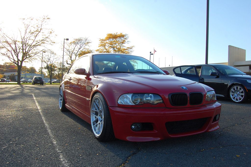 Red BMW E46 M3 with 18" ARC-8 Apex wheels in Hyper Silver